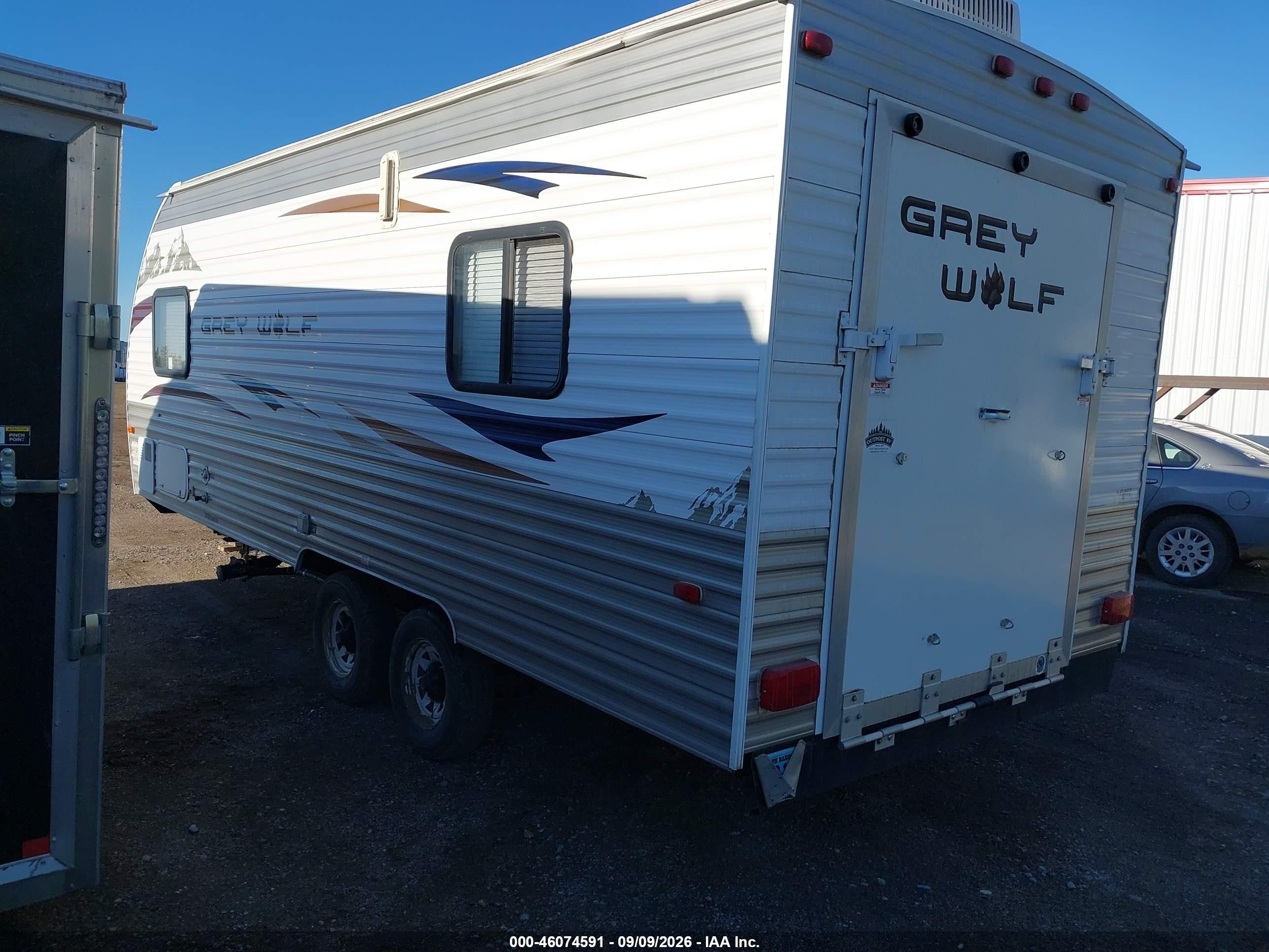 2012 Forest River Grey Wolf VIN 4X4TCKU28CY204041 IAAI salvage auction — Side, Salvage (North Dakota), sold $1,600 on 2026-10-10 (photo 3)