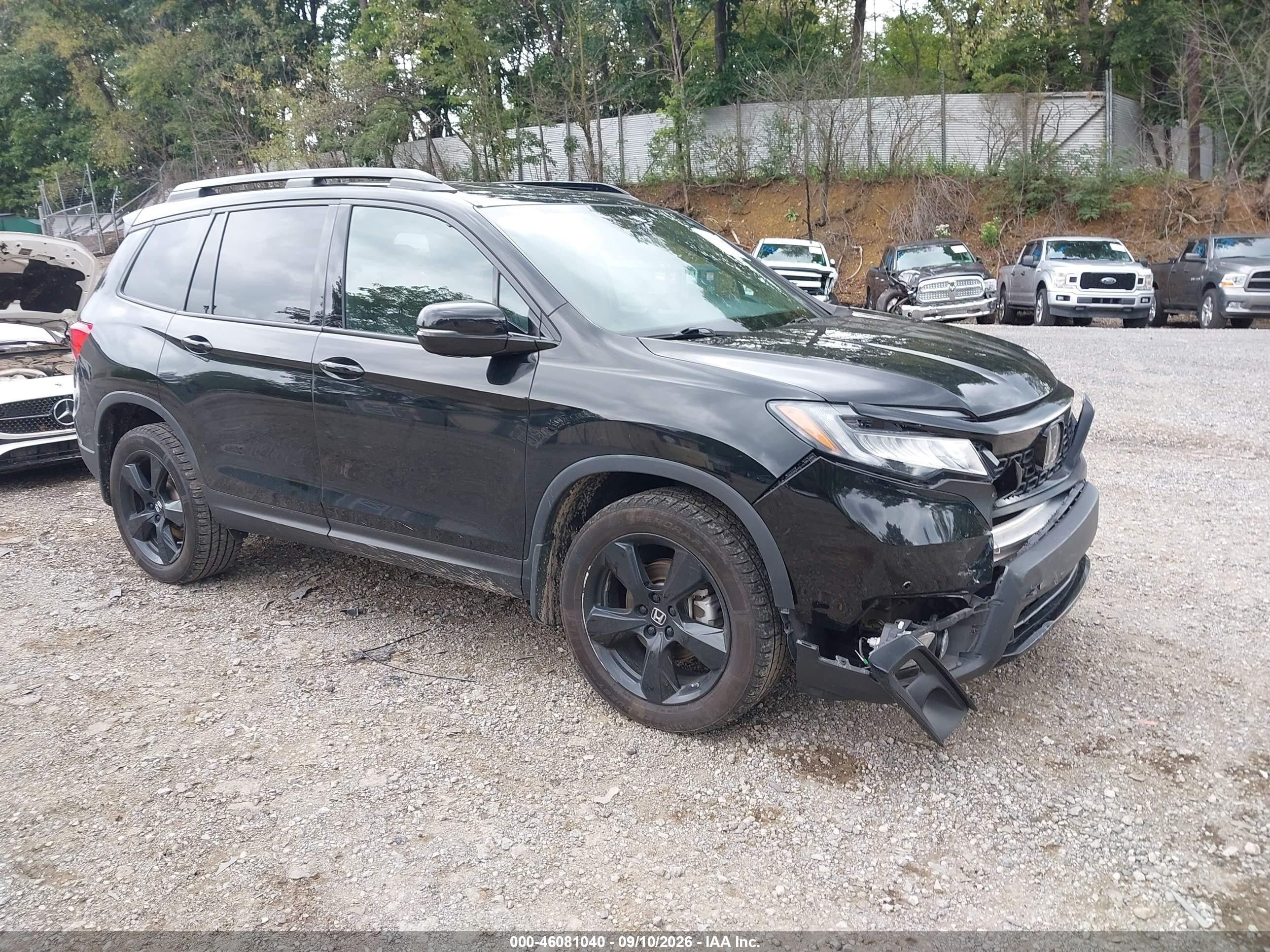 2021 Honda Passport VIN 5FNYF8H07MB003487 — IAAI salvage auction photo