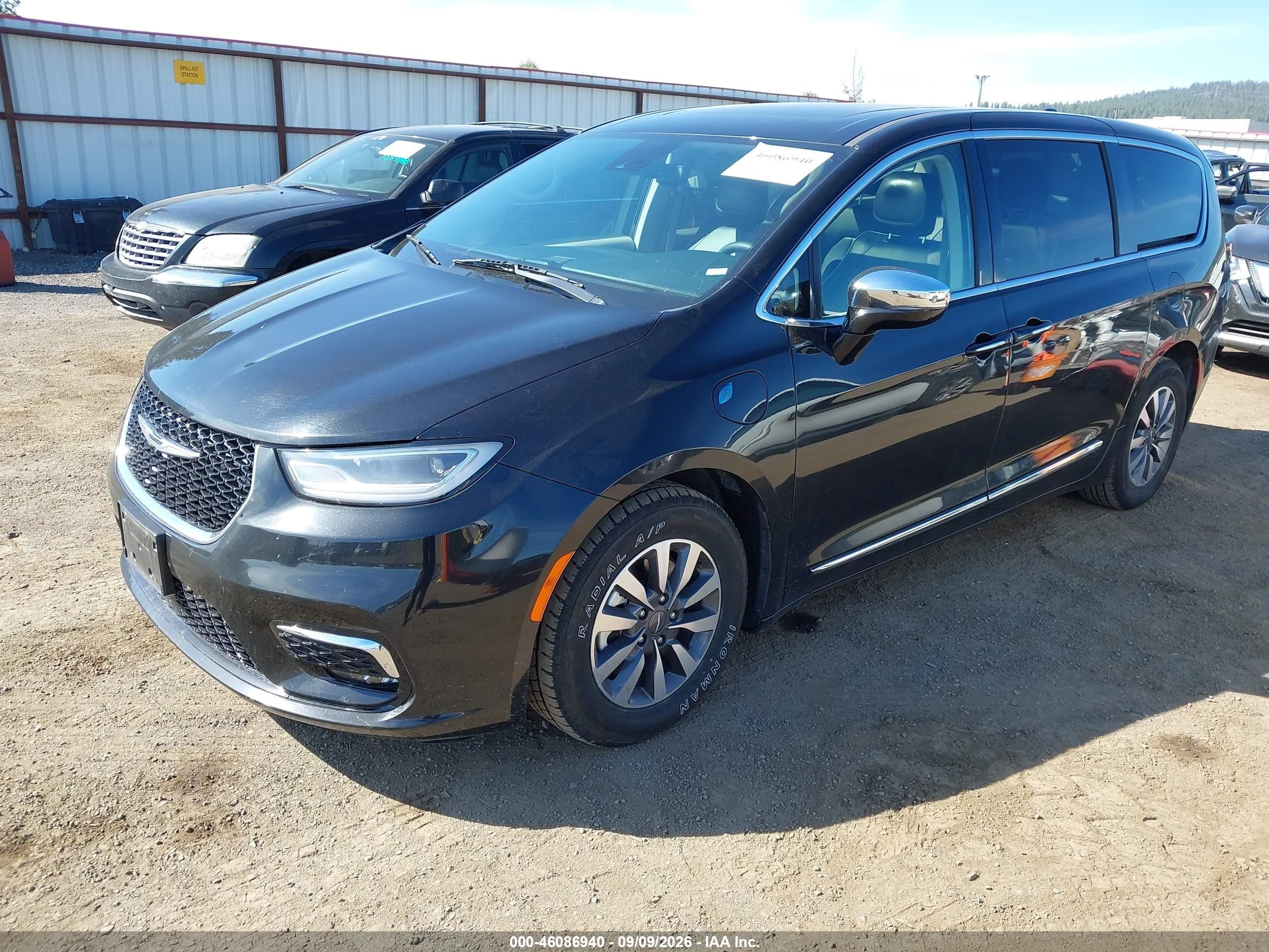 2023 Chrysler Pacifica VIN 2C4RC1S72PR632691 IAAI salvage auction — Side, Enterprise Vehicles Clear Only (California), sold $14,100 on 2026-09-14 (photo 2)