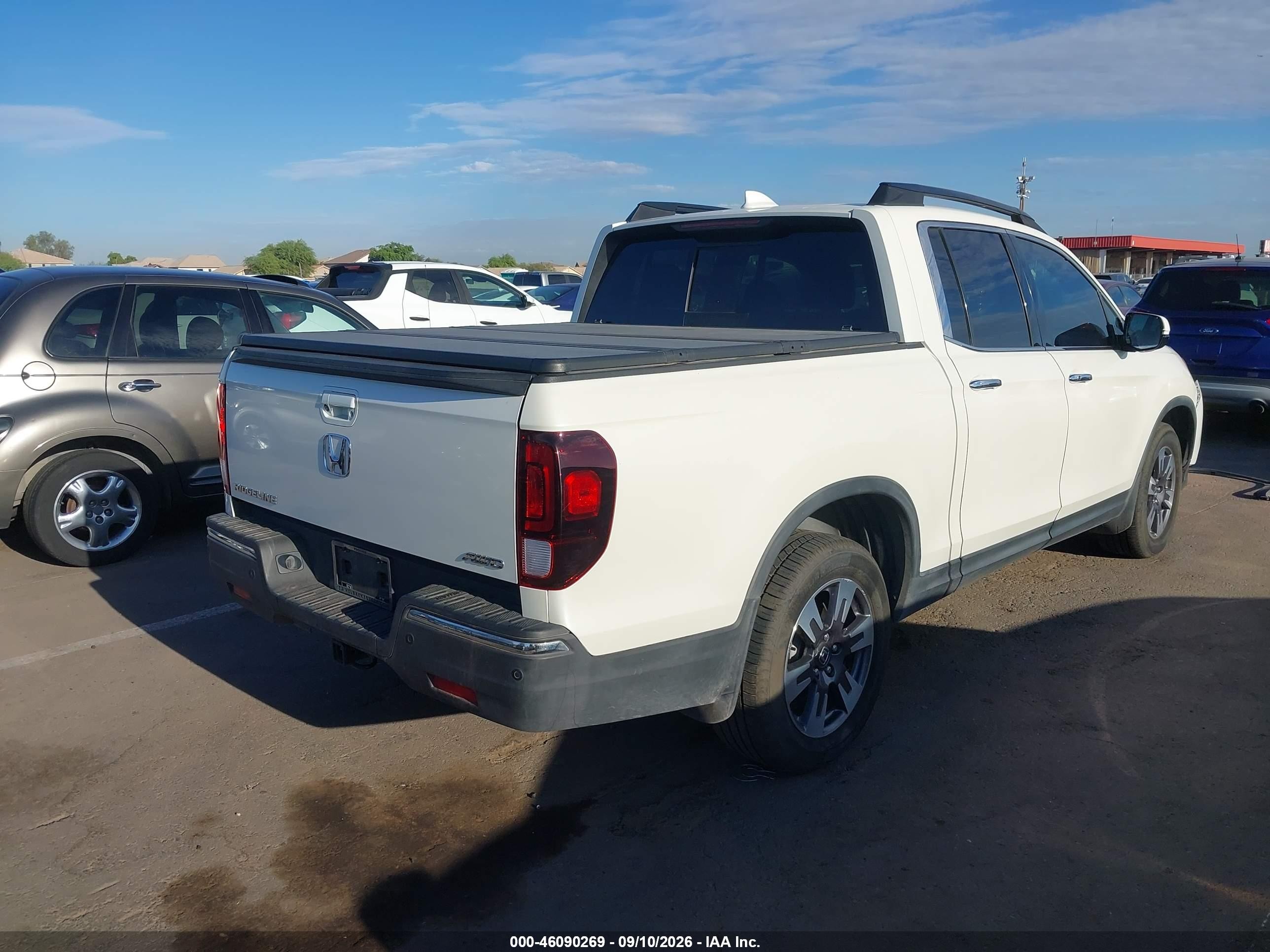 2019 Honda Ridgeline VIN 5FPYK3F73KB002940 IAAI salvage auction — Unknown, Salvage (Arizona), sold $7,600 on 2026-10-08 (photo 4)