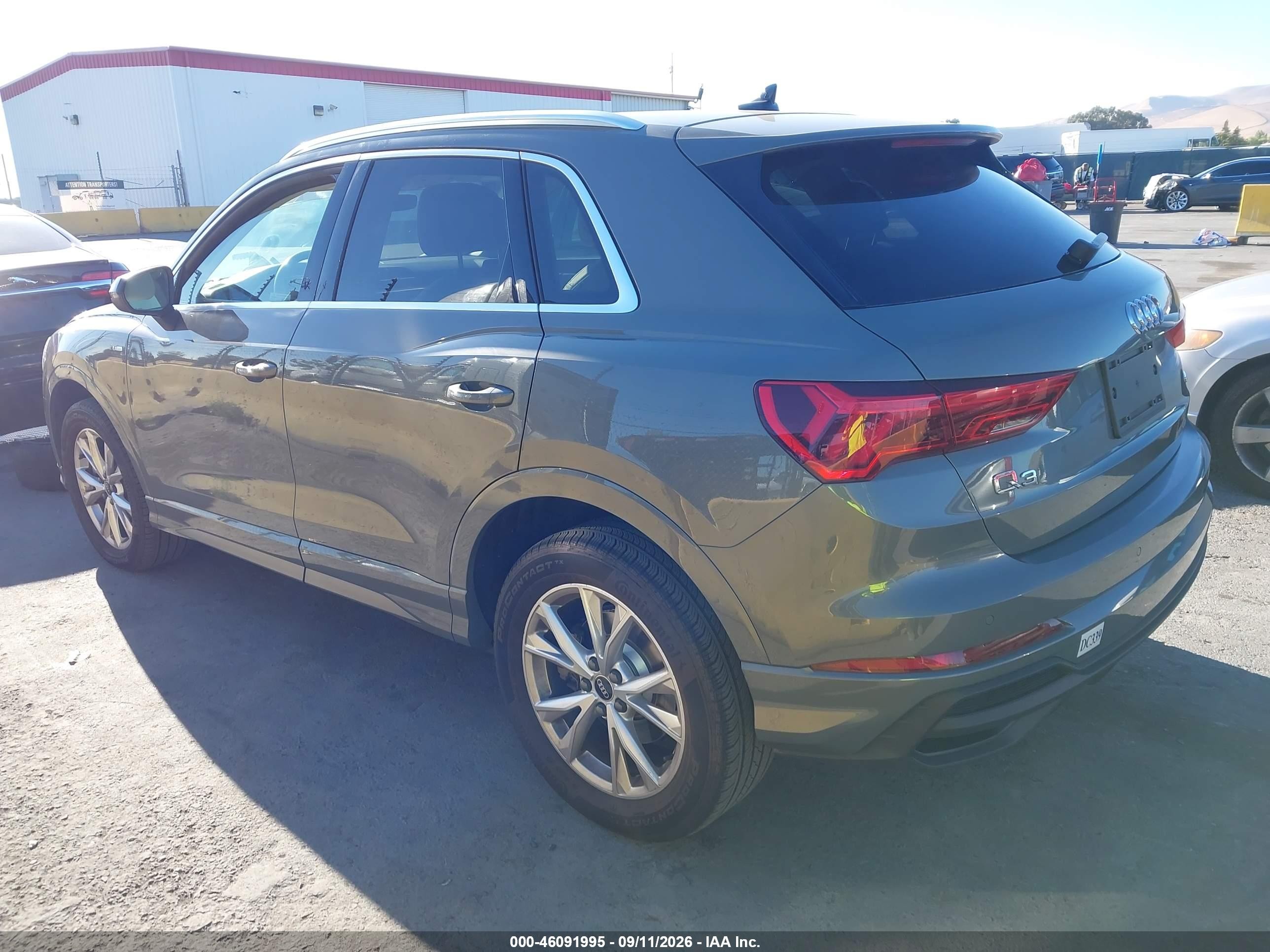 2023 Audi Q3 VIN WA1EECF36P1067761 IAAI salvage auction — Side, Salvage (California), sold $13,125 on 2026-09-27 (photo 3)