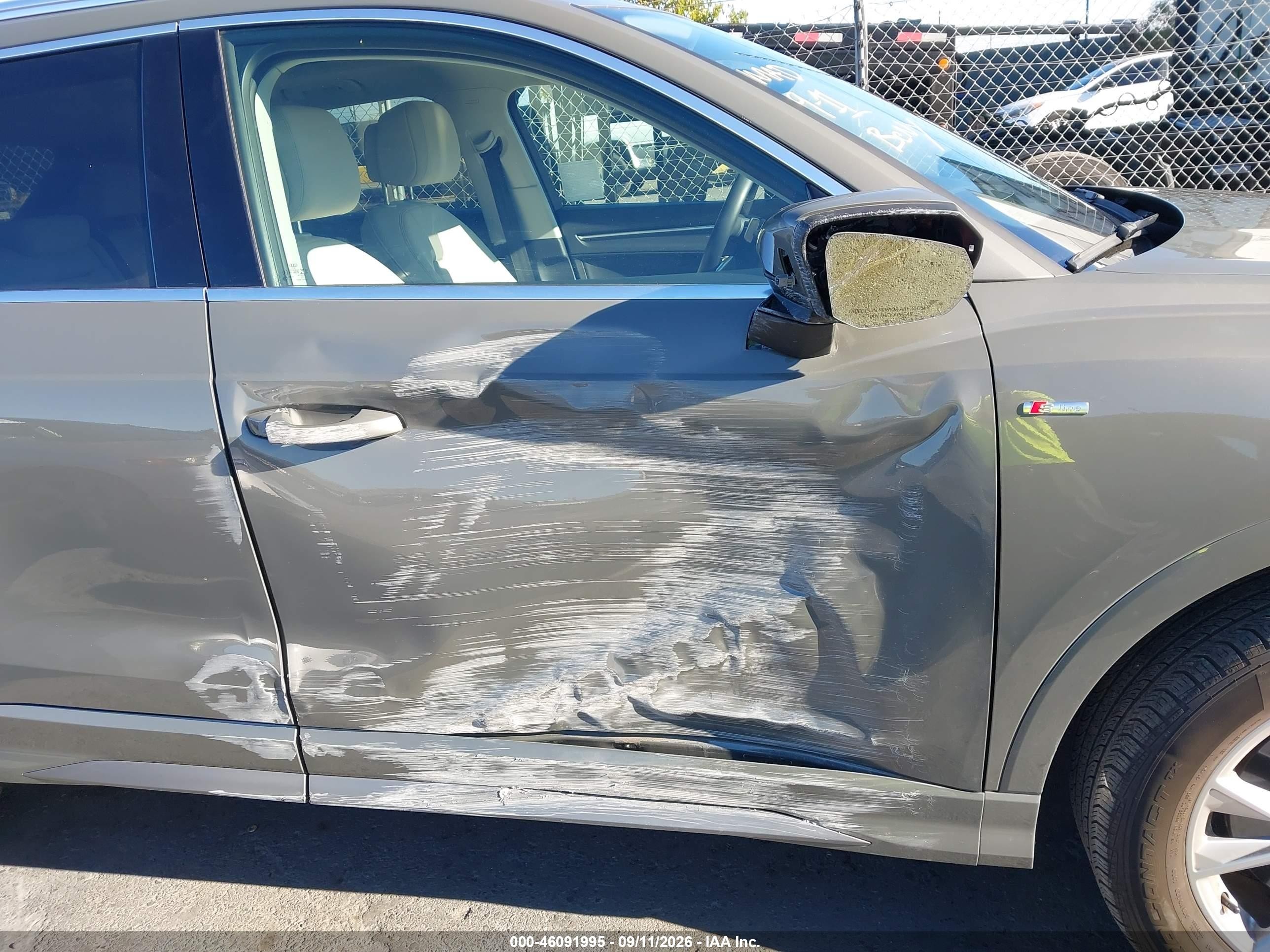 2023 Audi Q3 VIN WA1EECF36P1067761 IAAI salvage auction — Side, Salvage (California), sold $13,125 on 2026-09-27 (photo 6)
