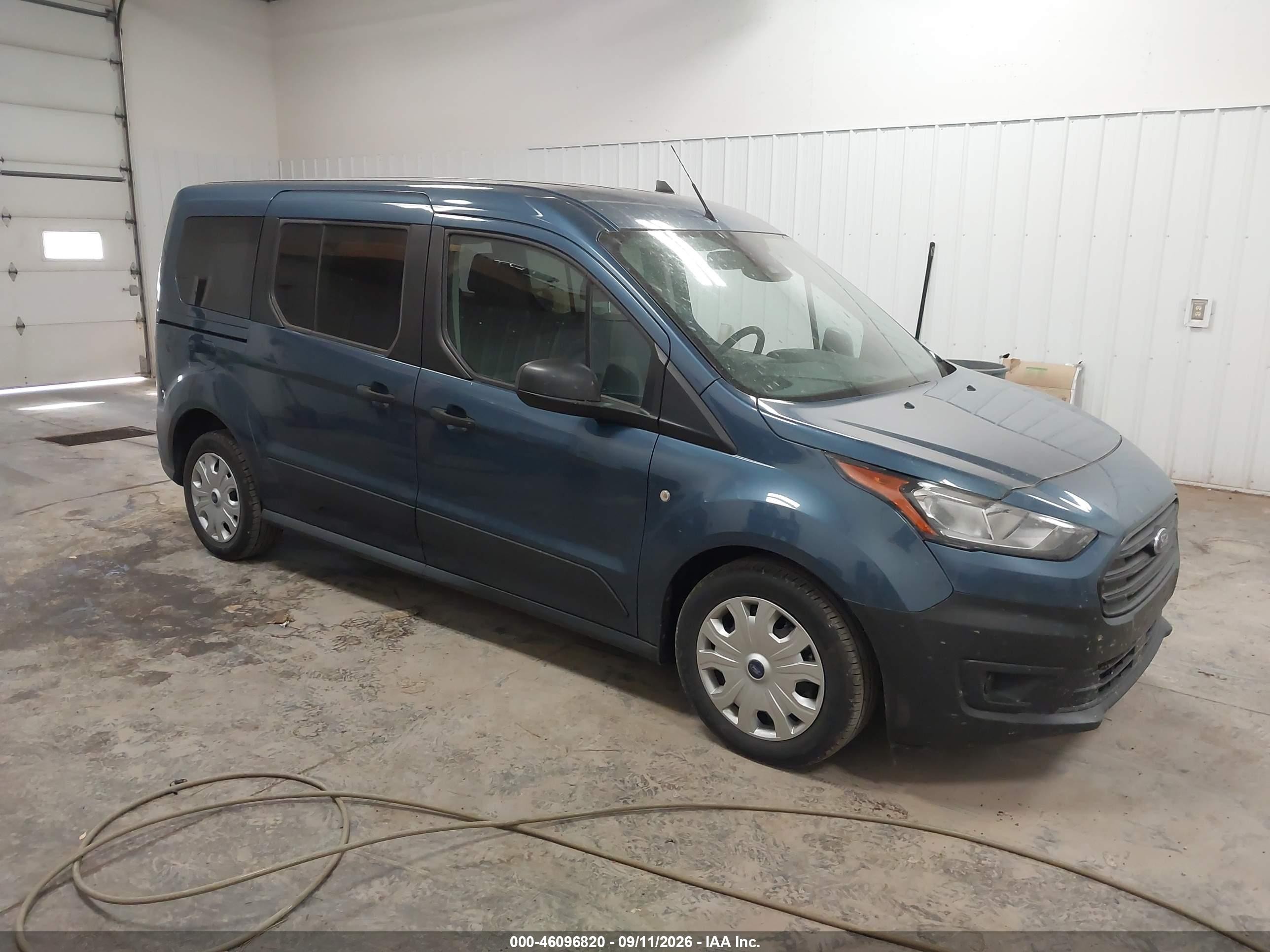 2023 Ford Transit Connect VIN NM0GE9E23P1557694 — IAAI salvage auction photo