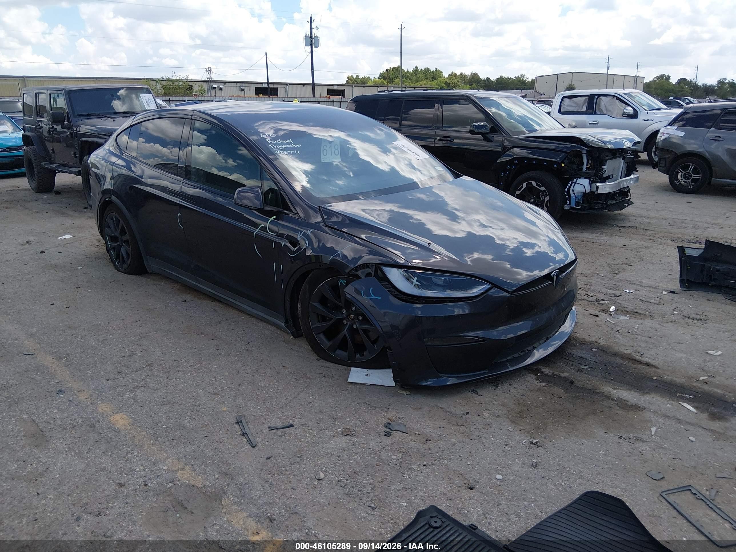 2023 Tesla Model X VIN 7SAXCAE5XPF428771 — IAAI salvage auction photo