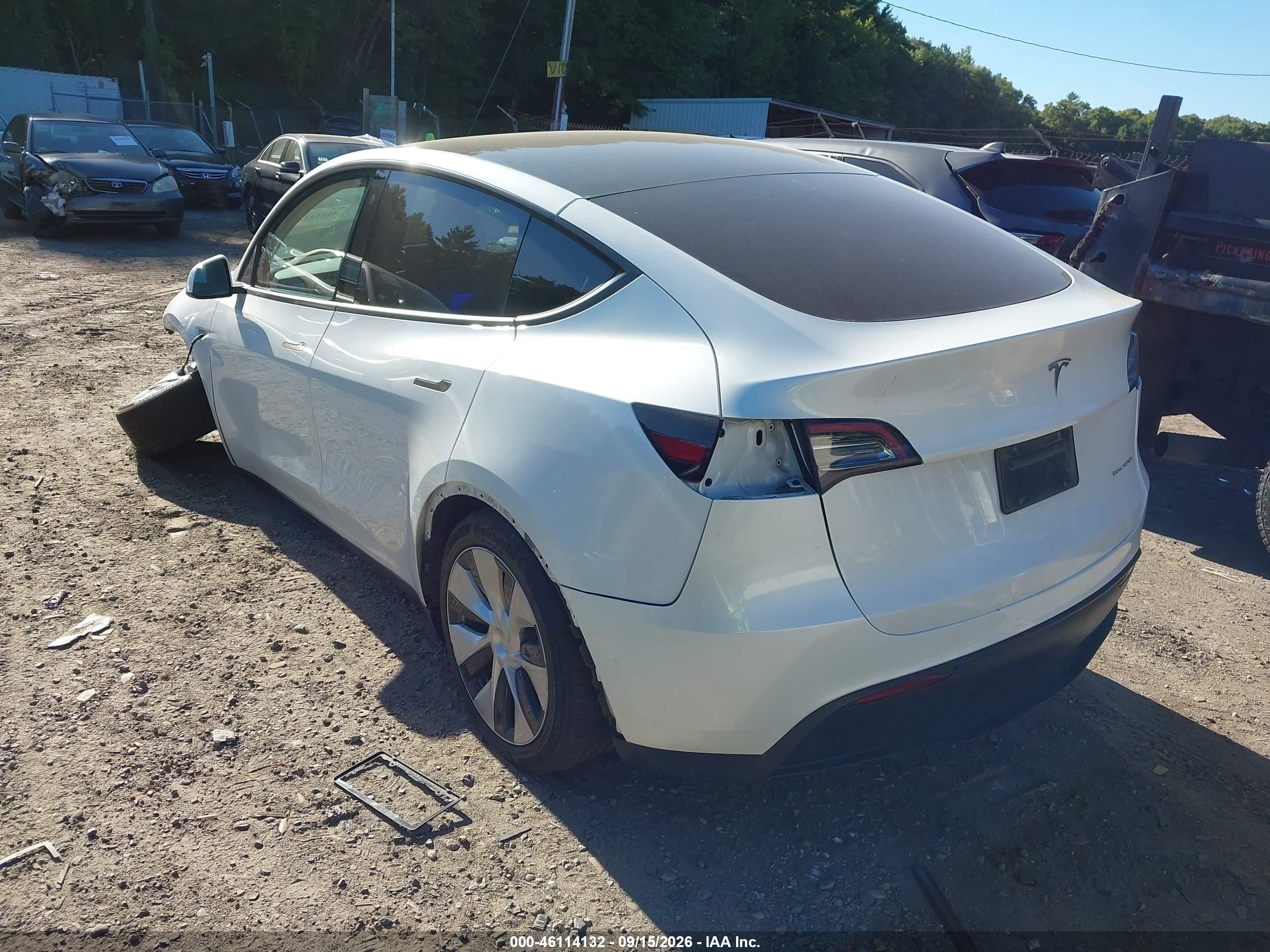 2023 Tesla Model y VIN 7SAYGDEE4PF706185 IAAI salvage auction — Unknown, Salvage (Massachusetts), sold $11,300 on 2026-09-29 (photo 3)