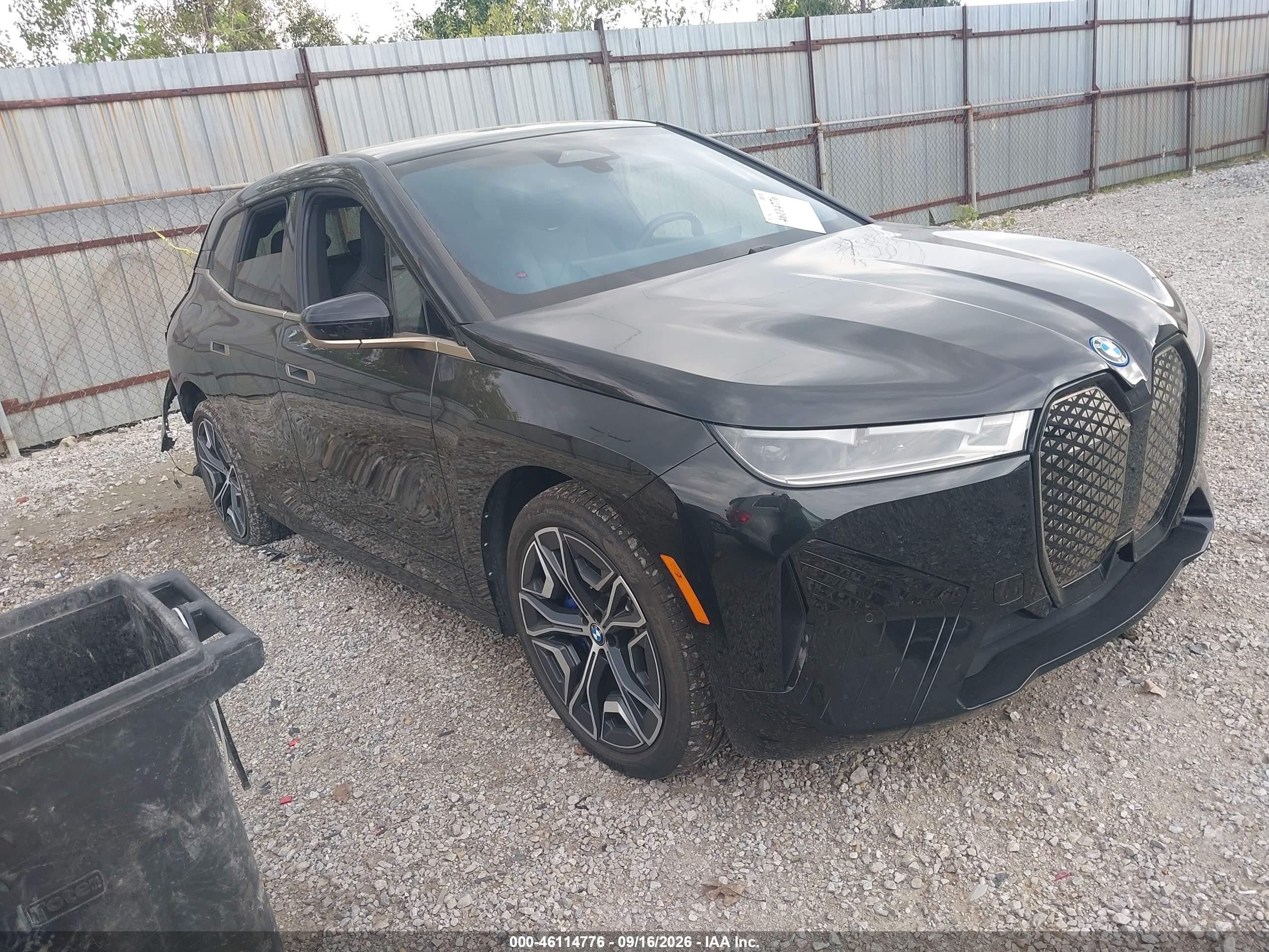 2023 BMW iX VIN WB523CF07PCM00988 — IAAI salvage auction photo