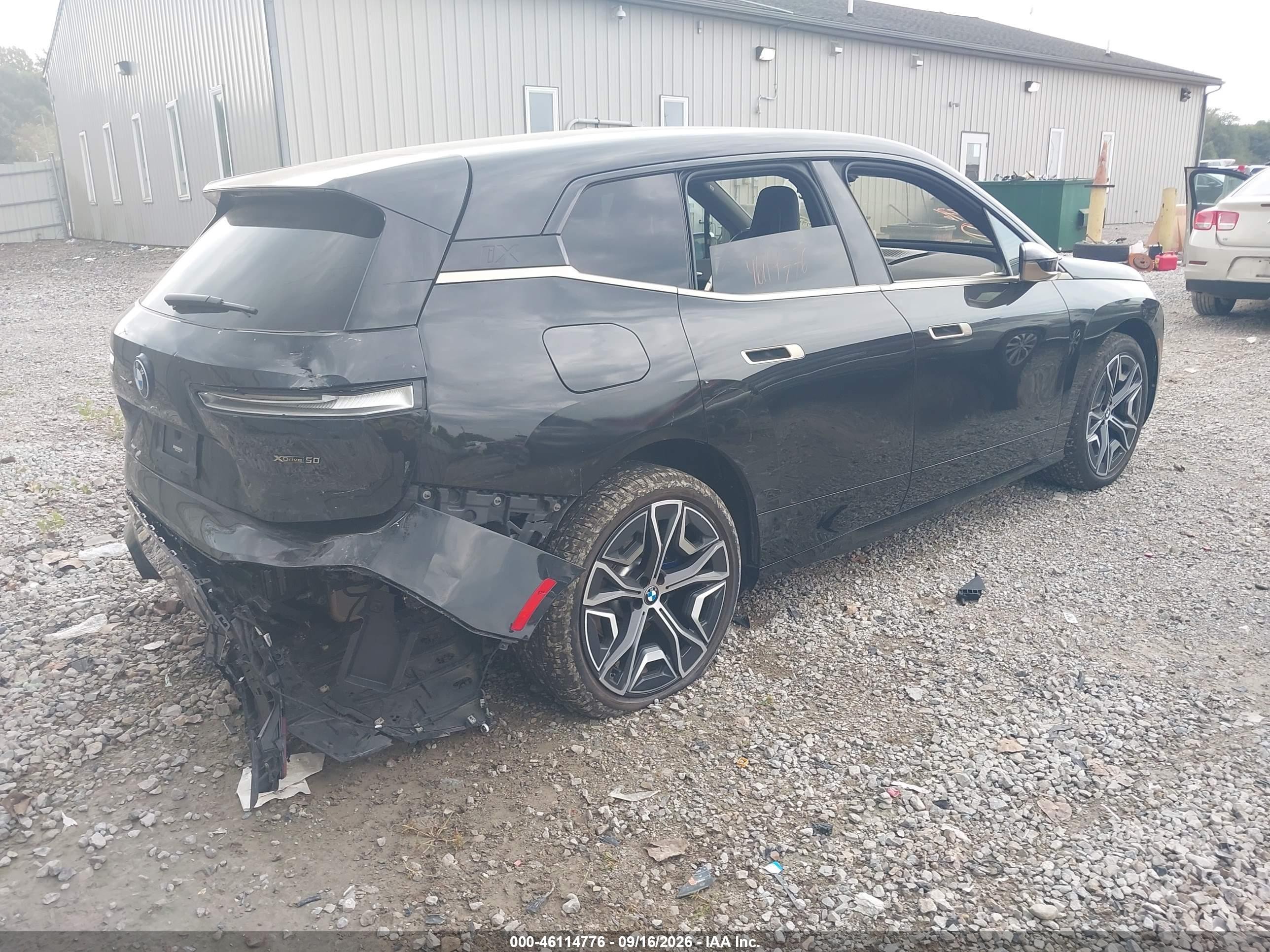 2023 BMW Ix VIN WB523CF07PCM00988 IAAI salvage auction — Rear End, Salvage (Ohio), sold $26,500 on 2026-10-09 (photo 4)