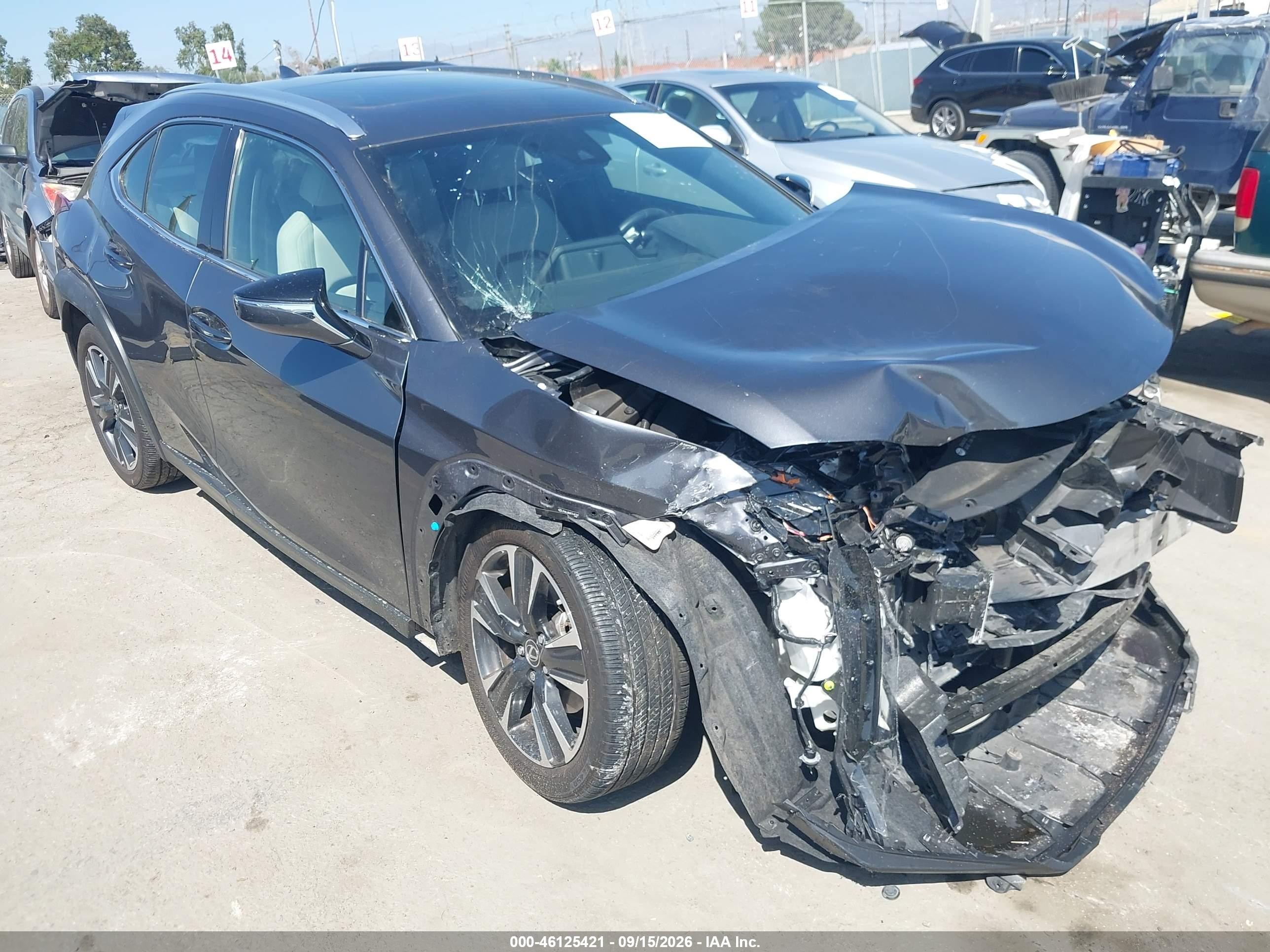 2023 Lexus UX 250h VIN JTHX6JBH5P2145747 — IAAI salvage auction photo