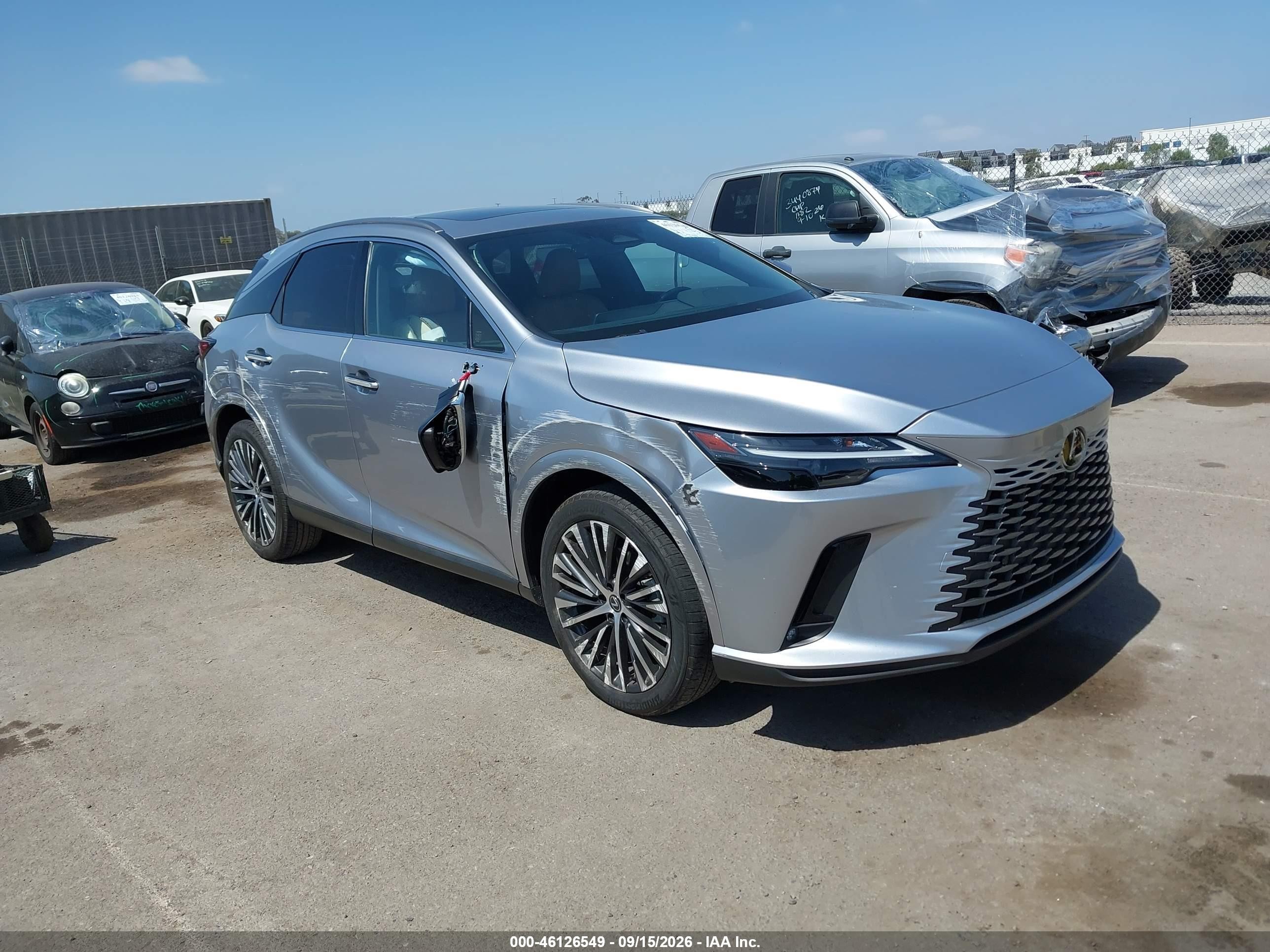 2025 Lexus Rx VIN JTJCHMAA3S2021157 IAAI salvage auction — Side, Salvage (California), sold $29,900 on 2026-10-01 (photo 1)