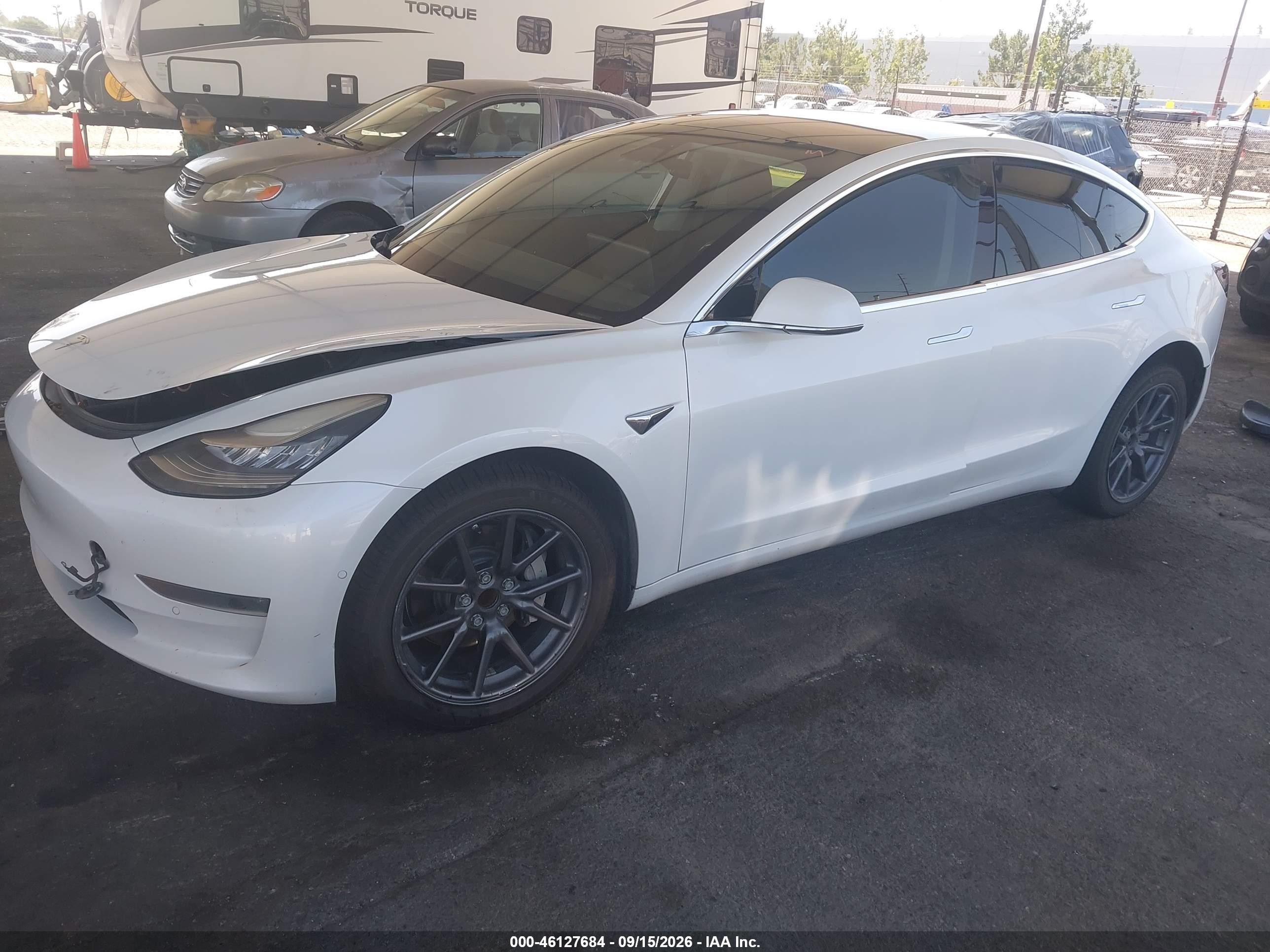2018 Tesla Model 3 VIN 5YJ3E1EA6JF162143 IAAI salvage auction — Rear End, Salvage (California), sold $4,100 on 2026-10-16 (photo 2)