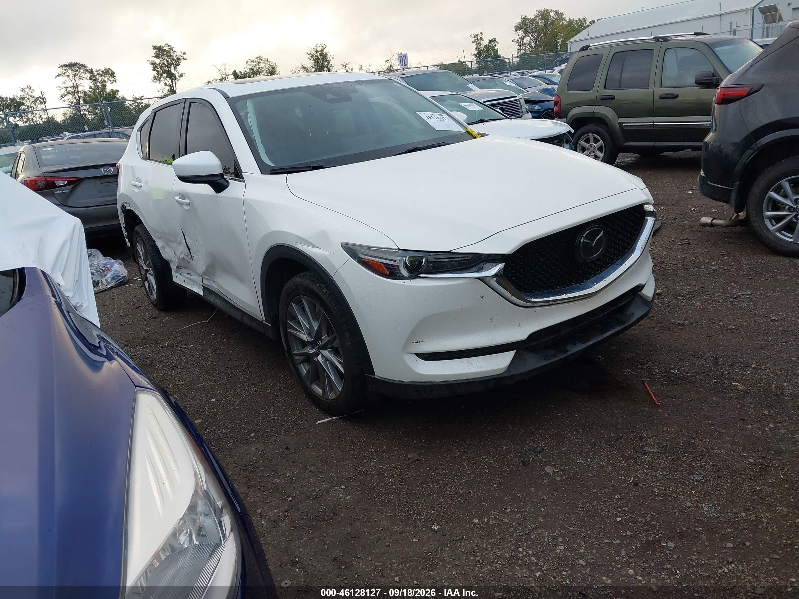 2021 Mazda Cx-5 VIN JM3KFBAY4M0487756 IAAI salvage auction — Side, Salvage (Ohio), sold $9,900 on 2026-10-02 (photo 1)
