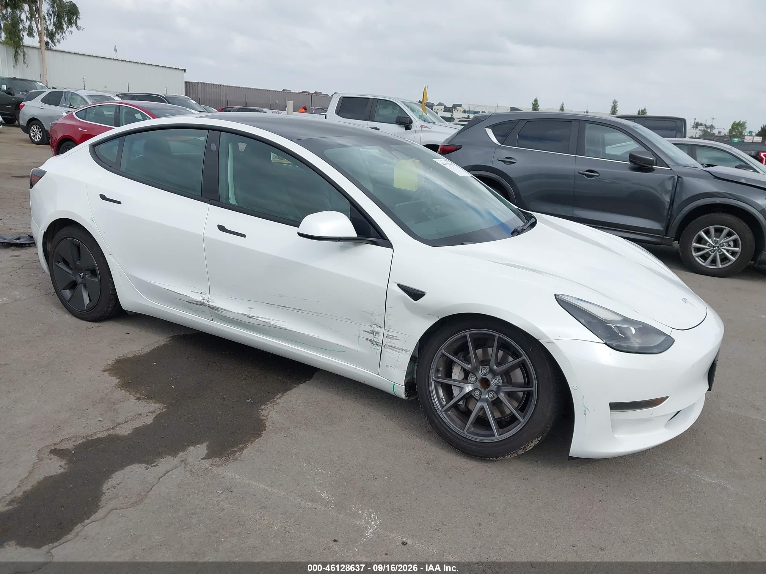 2021 Tesla Model 3 VIN 5YJ3E1EA5MF074947 — IAAI salvage auction photo