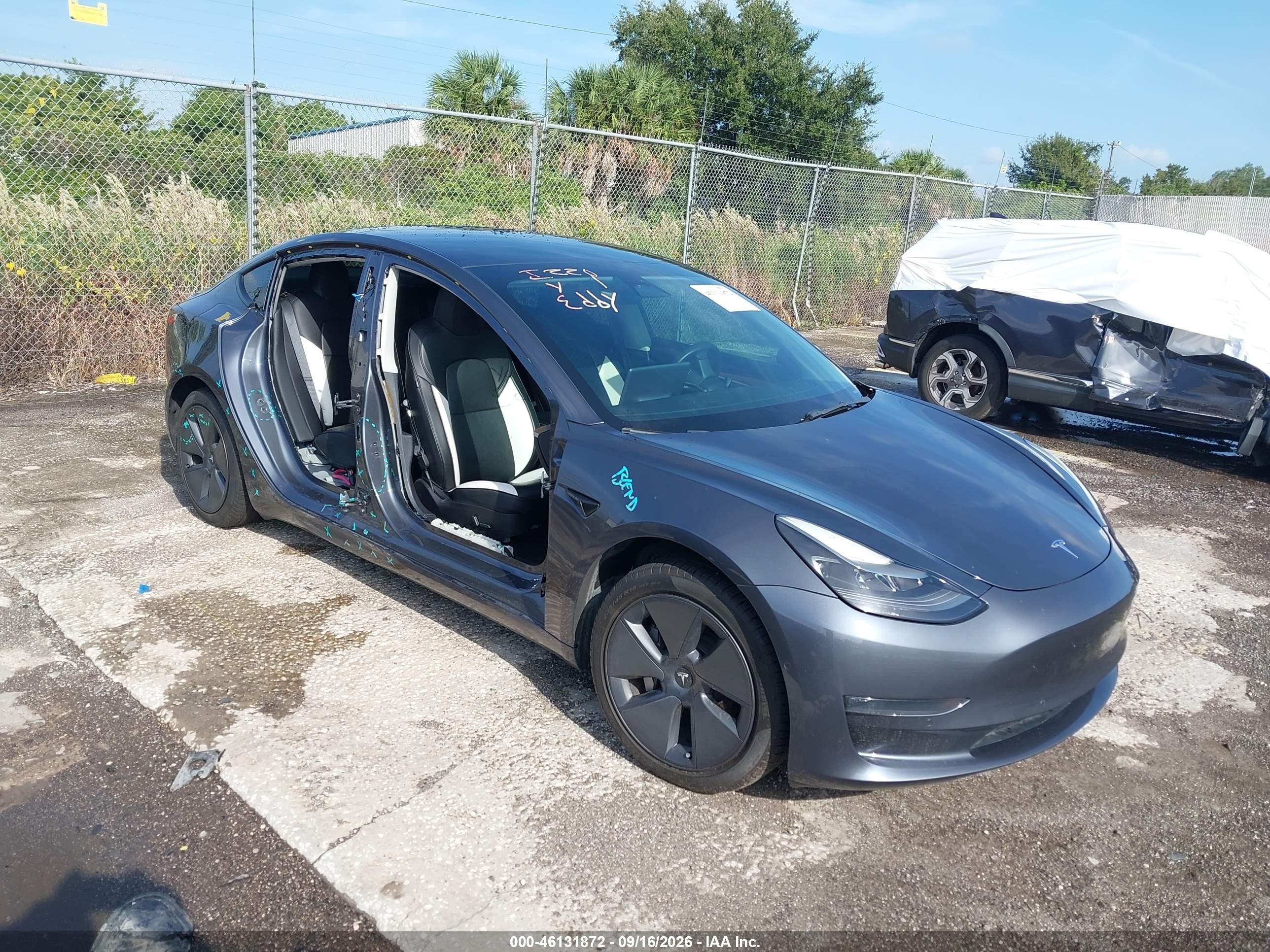 2022 Tesla Model 3 VIN 5YJ3E1EB6NF174064 — IAAI salvage auction photo