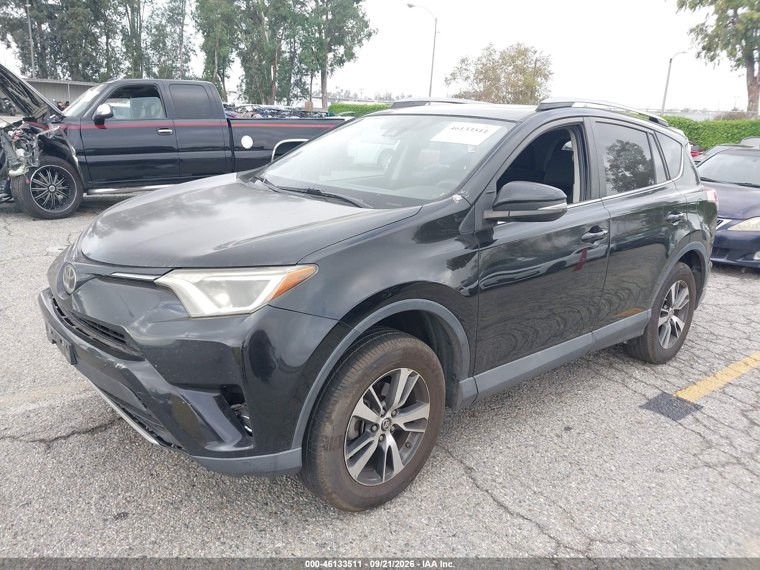 2018 Toyota Rav 4 VIN 2T3WFREV2JW435620 IAAI salvage auction — Front & Rear, Salvage (California), sold $4,150 on 2026-09-25 (photo 2)