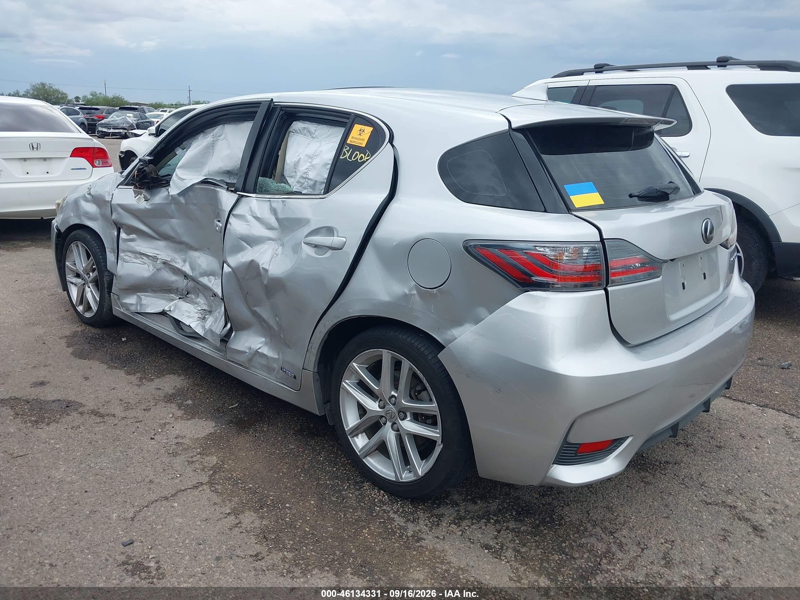 2014 Lexus Ct VIN JTHKD5BH5E2203439 IAAI salvage auction — Side, Salvage (Arizona), sold $1,300 on 2026-10-03 (photo 3)
