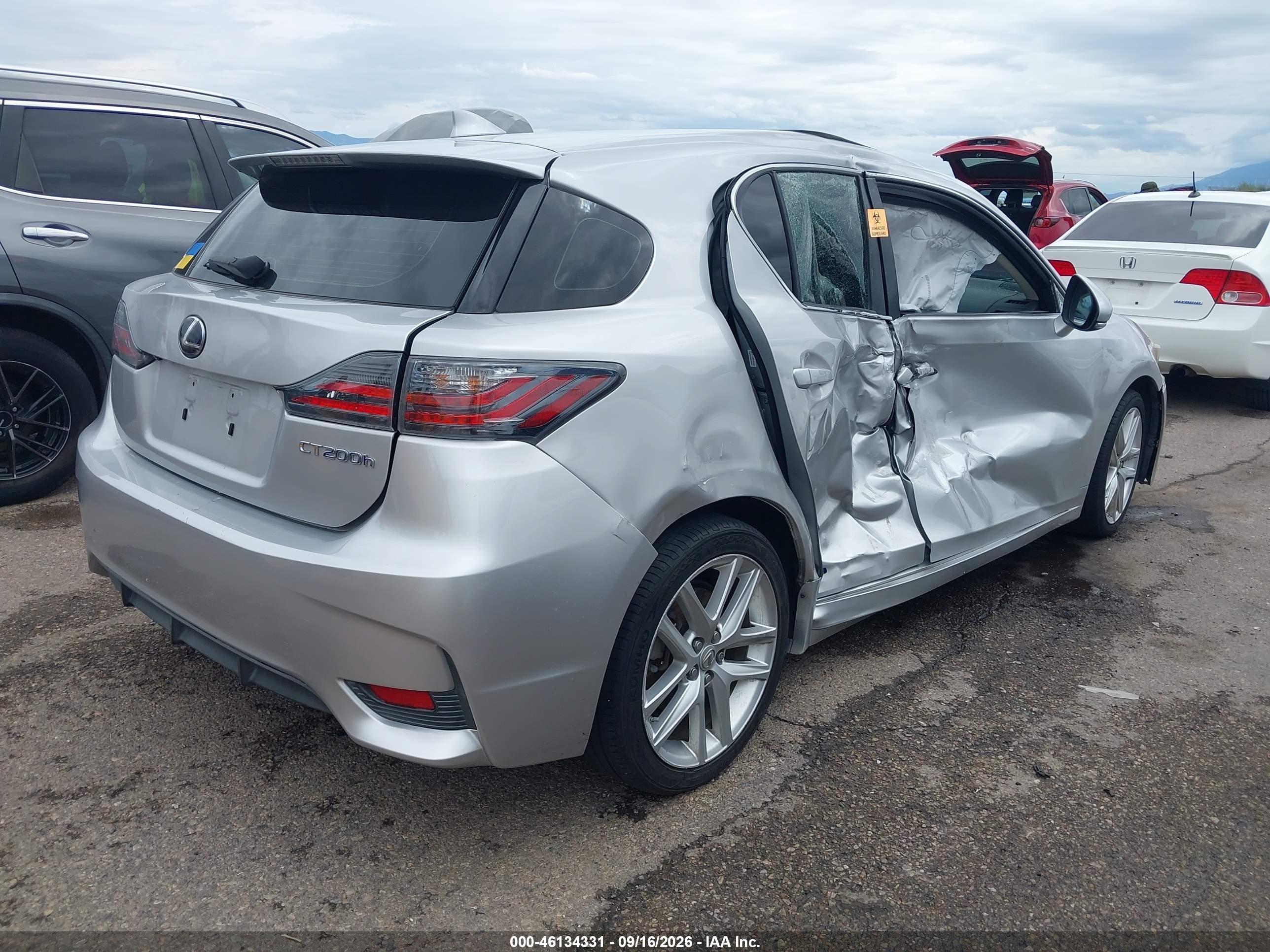 2014 Lexus Ct VIN JTHKD5BH5E2203439 IAAI salvage auction — Side, Salvage (Arizona), sold $1,300 on 2026-10-03 (photo 4)