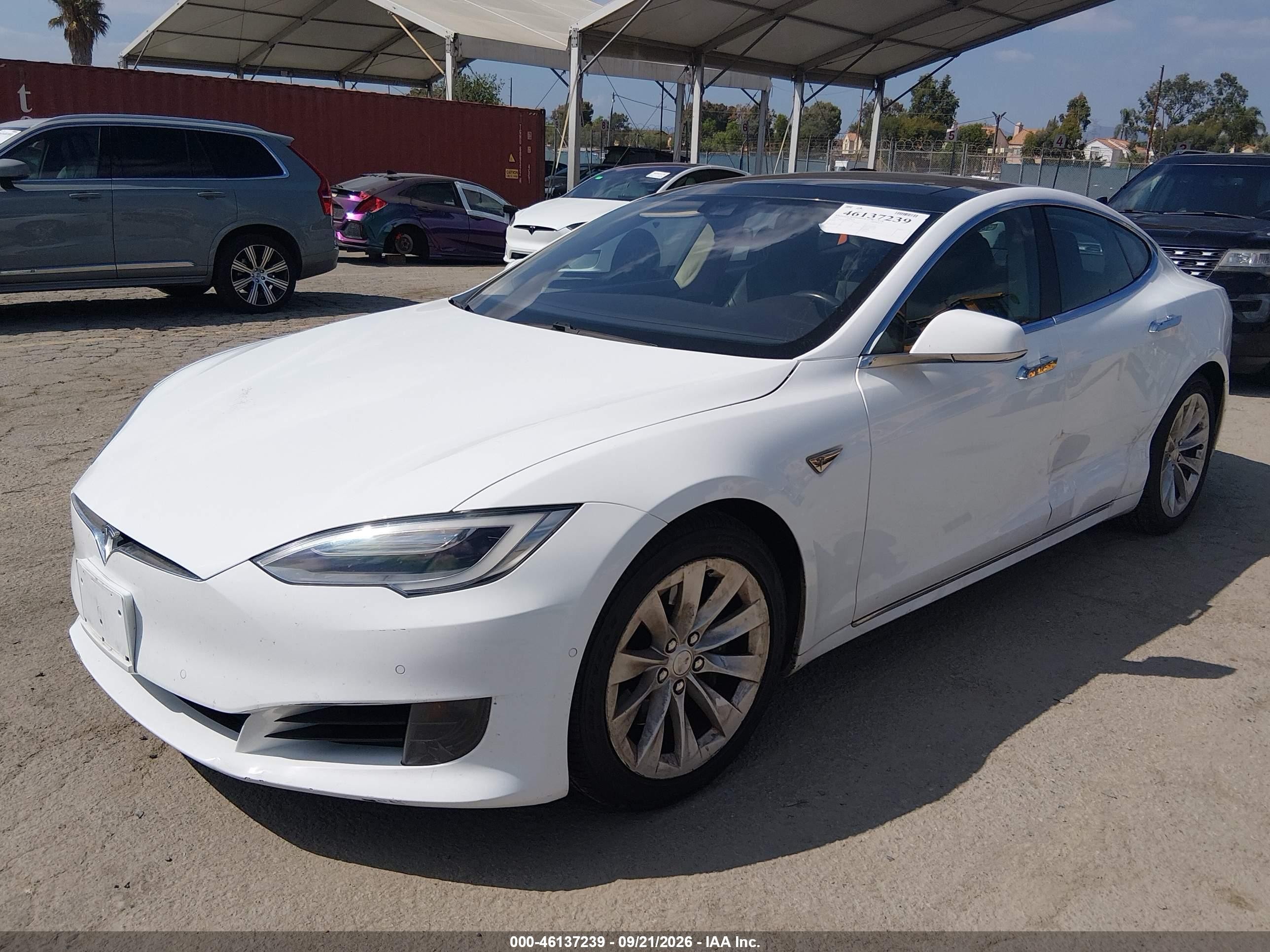 2016 Tesla Model s VIN 5YJSA1E19GF147362 IAAI salvage auction — Side, Salvage (California), sold $5,475 on 2026-09-28 (photo 2)