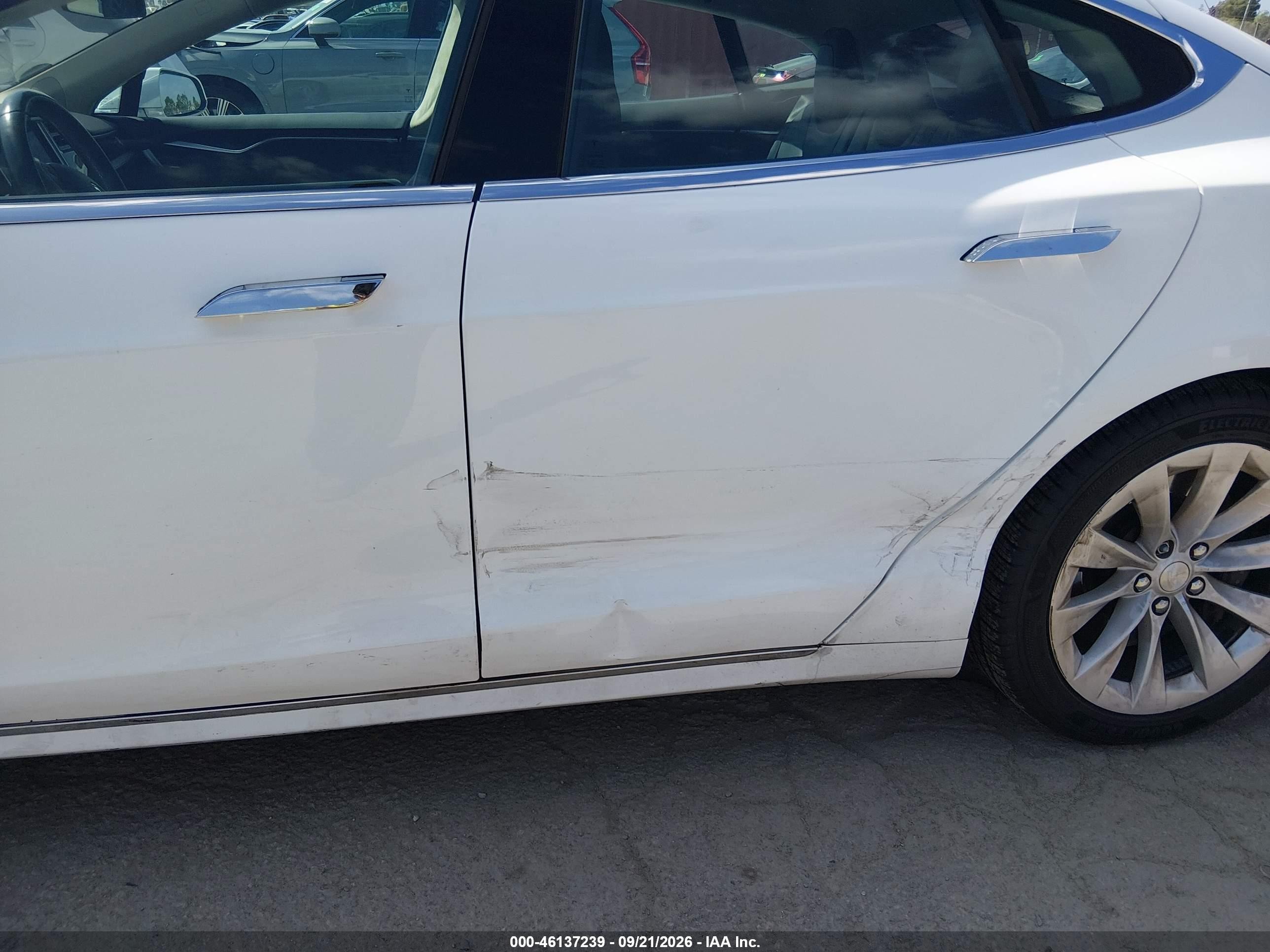 2016 Tesla Model s VIN 5YJSA1E19GF147362 IAAI salvage auction — Side, Salvage (California), sold $5,475 on 2026-09-28 (photo 6)