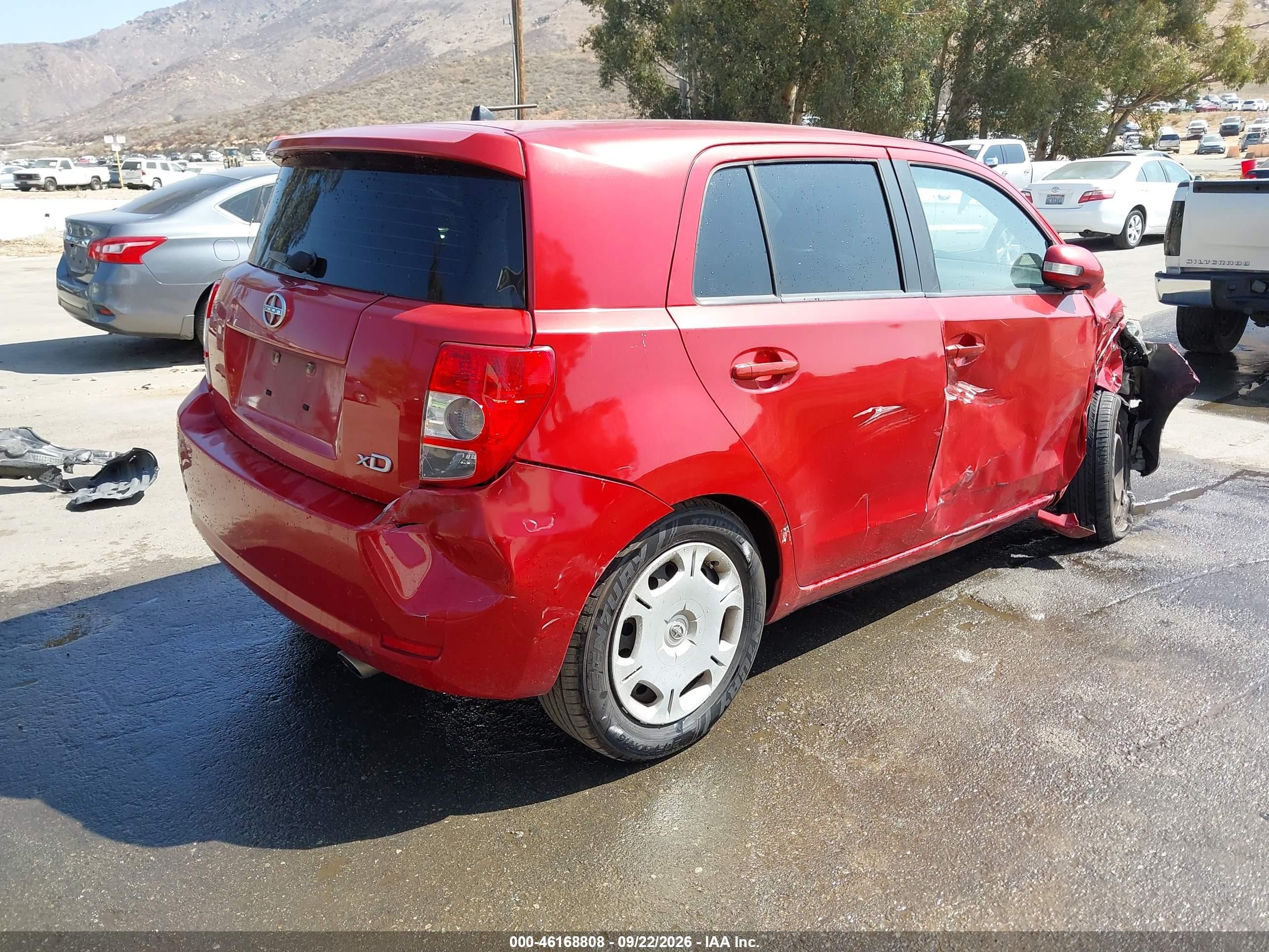 2014 Scion xD VIN JTKKUPB43E1046521 IAAI salvage auction — Side, Salvage (California), sold $1,325 on 2026-10-01 (photo 4)