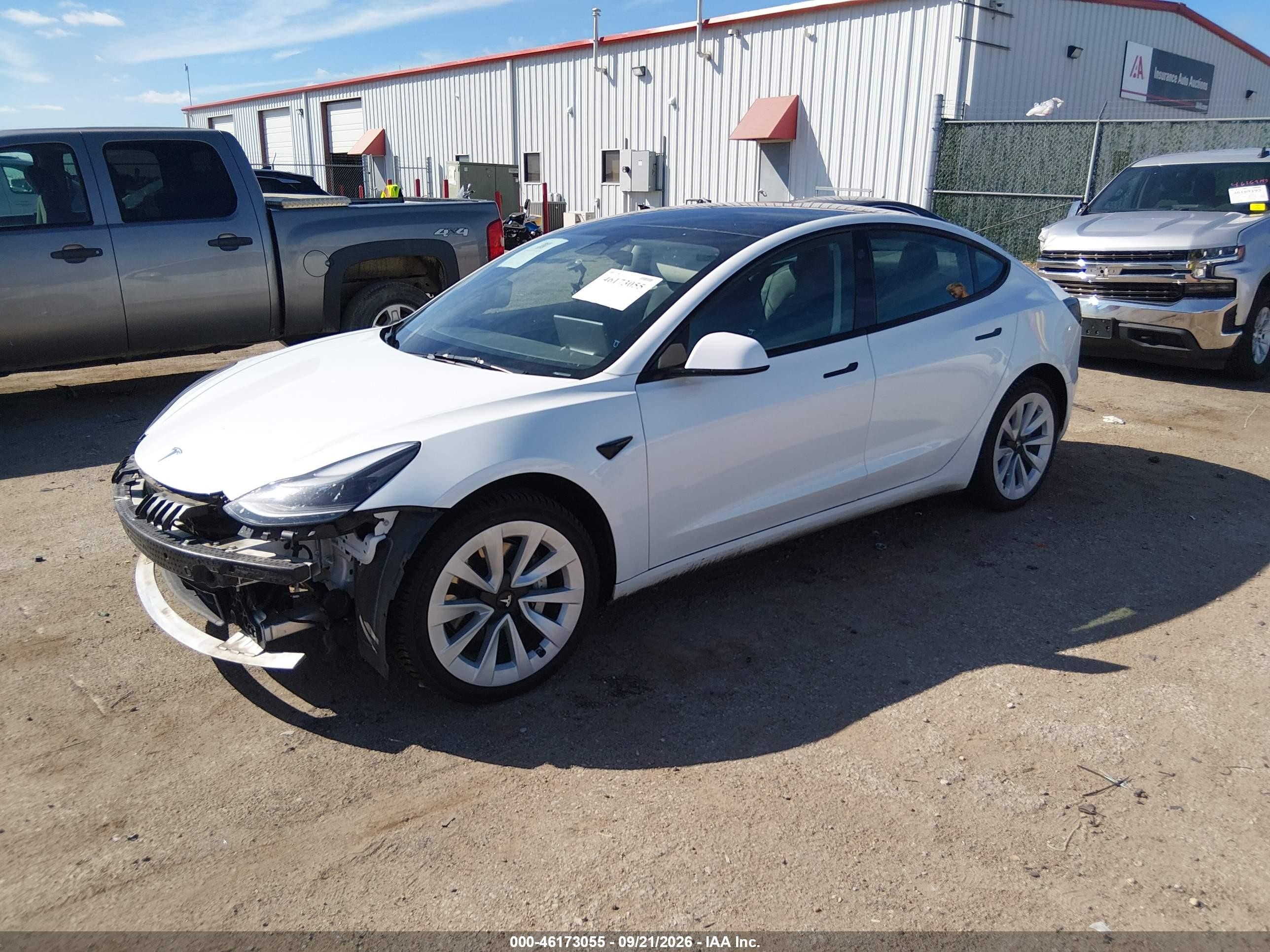2023 Tesla Model 3 VIN 5YJ3E1EB7PF393389 IAAI salvage auction — Front End, Salvage (Kansas), sold $11,200 on 2026-10-06 (photo 2)
