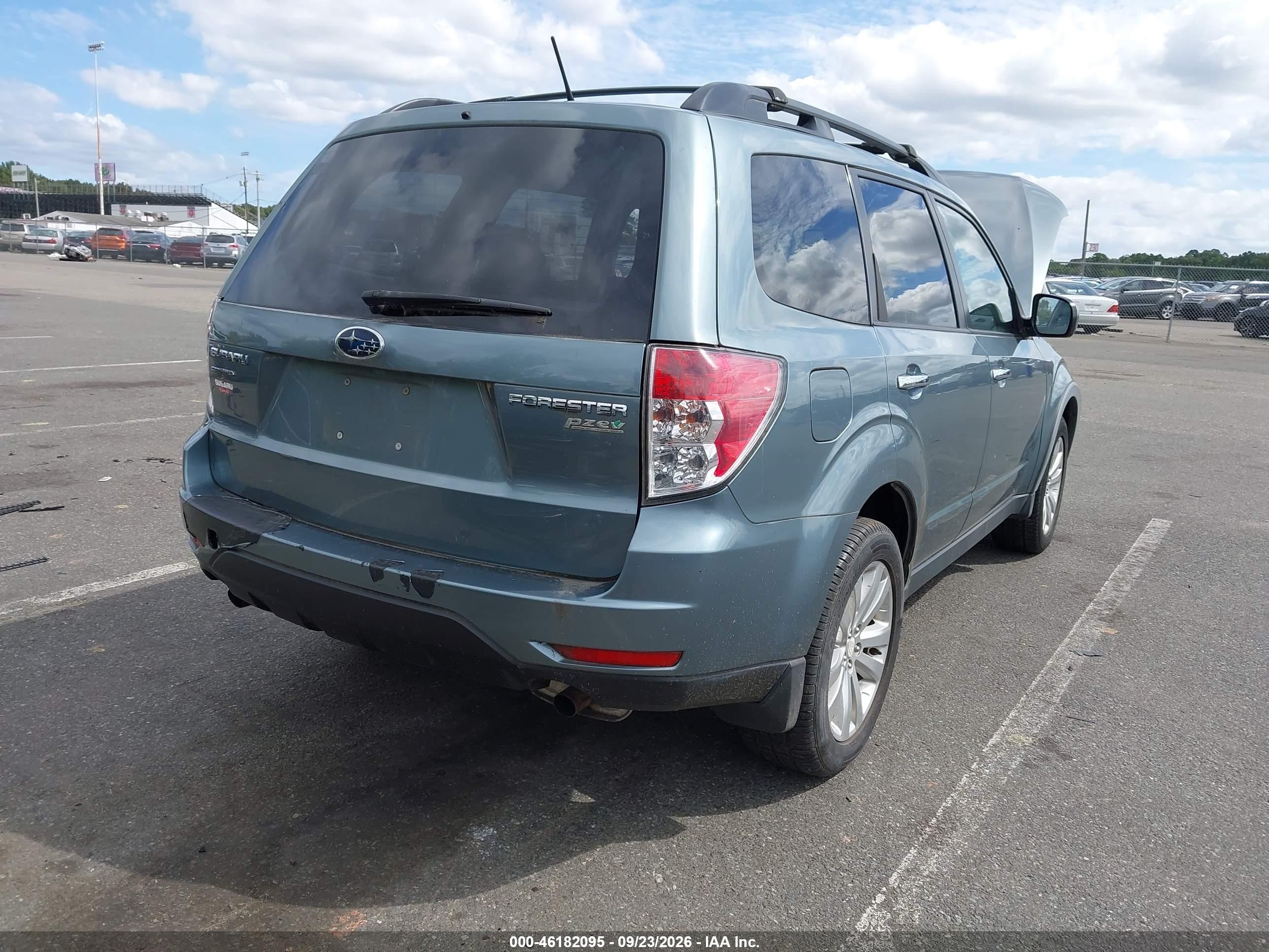 2011 Subaru Forester VIN JF2SHADC4BH727871 IAAI salvage auction — Front & Rear, Clear (New Jersey), sold $850 on 2026-10-06 (photo 4)