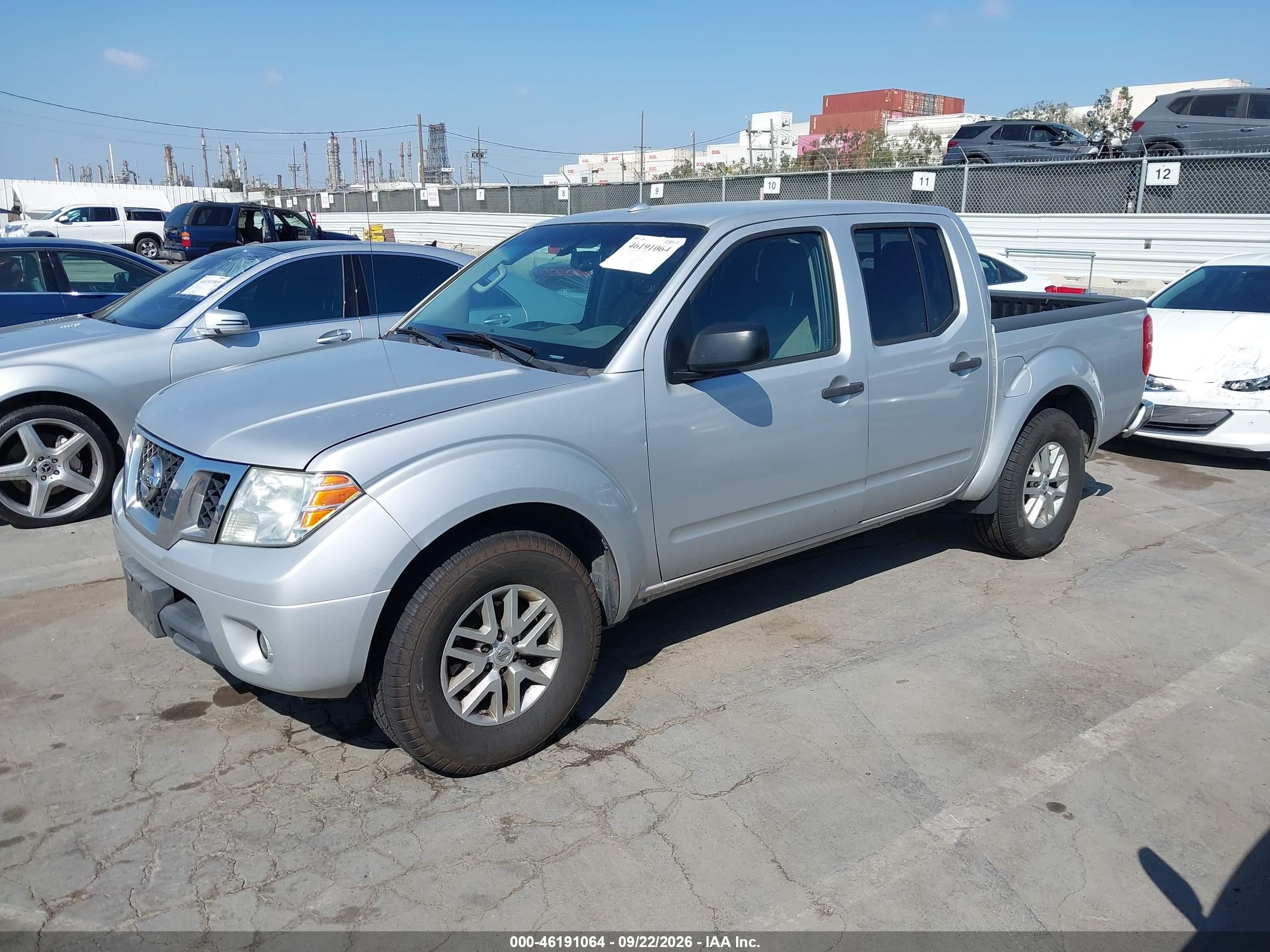 2016 Nissan Navara (frontier) VIN 1N6AD0ER7GN792139 IAAI salvage auction — Side, Salvage (California), sold $3,100 on 2026-10-08 (photo 2)