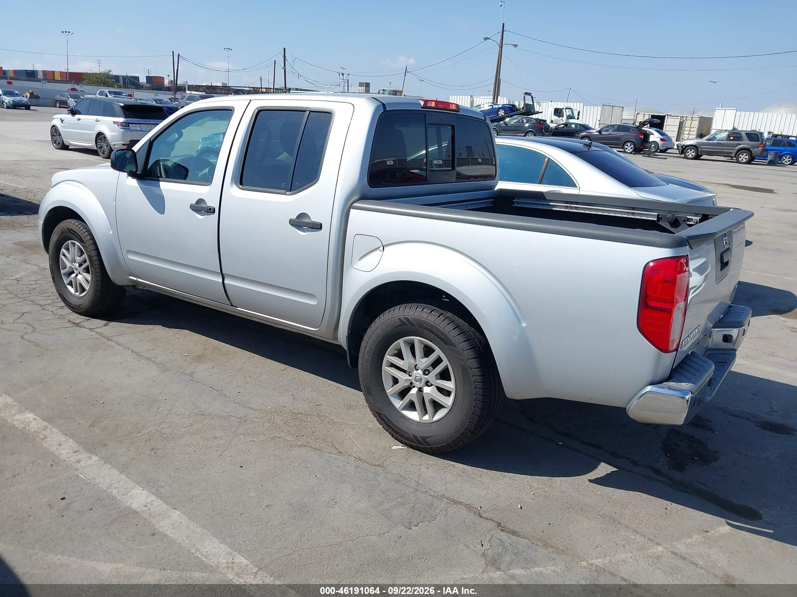 2016 Nissan Navara (frontier) VIN 1N6AD0ER7GN792139 IAAI salvage auction — Side, Salvage (California), sold $3,100 on 2026-10-08 (photo 3)