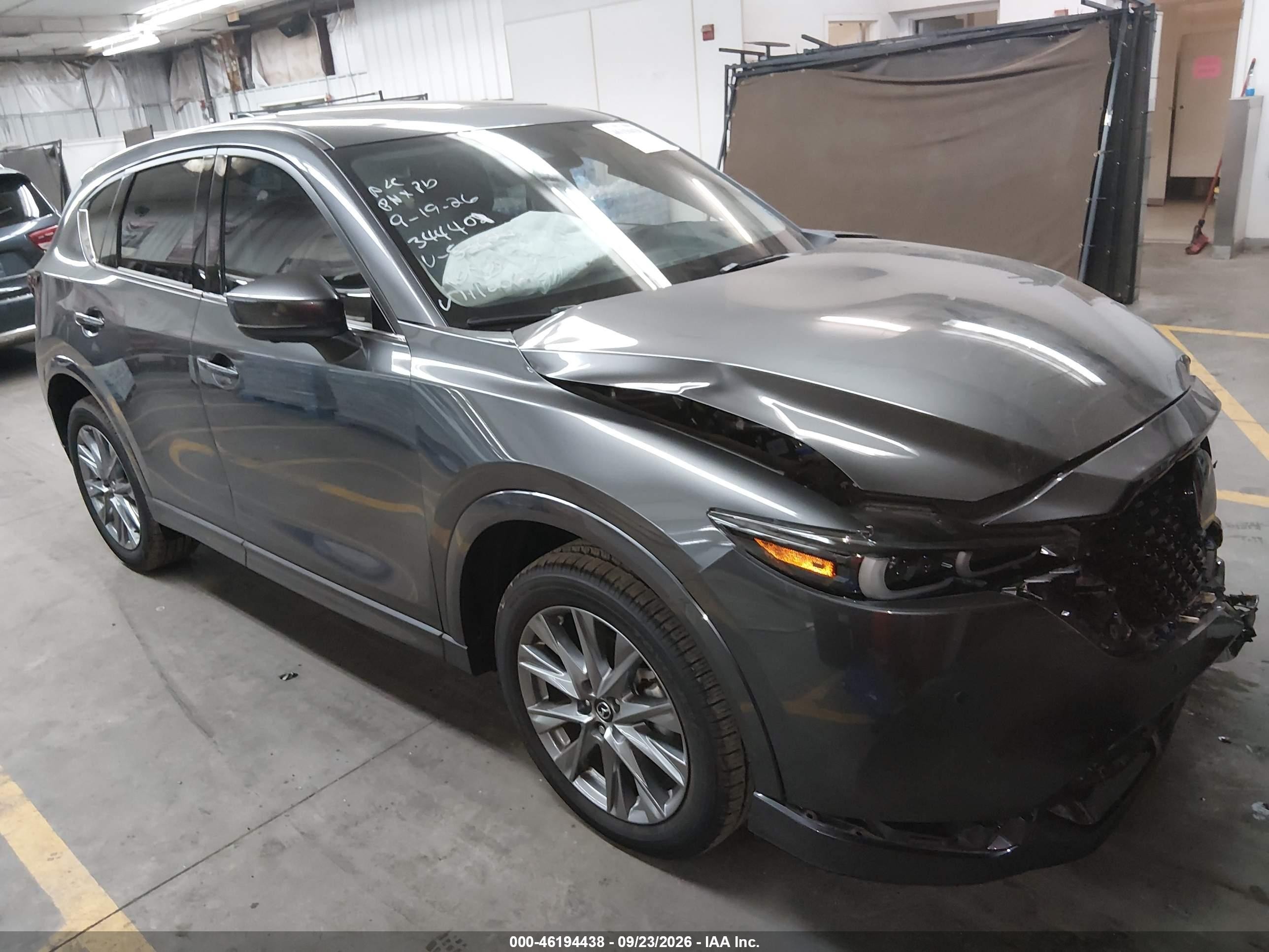 2025 Mazda CX-5 VIN JM3KFBEM5S0711296 — IAAI salvage auction photo