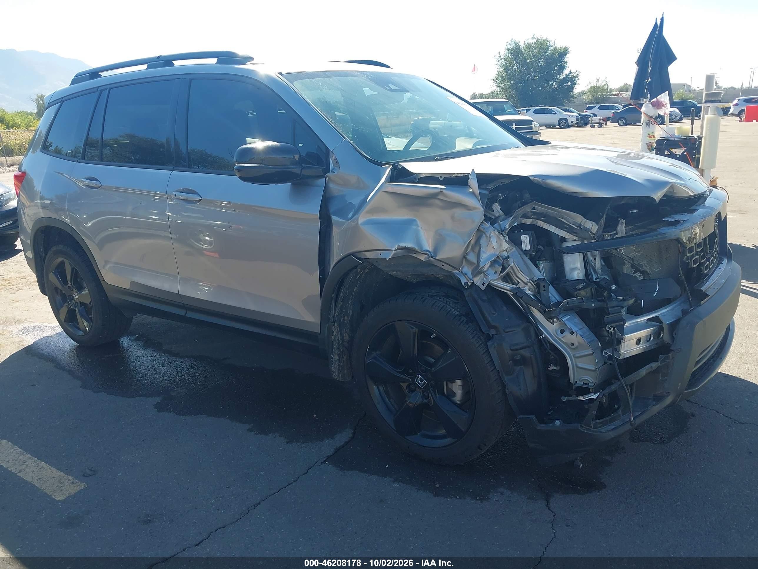 2021 Honda Passport VIN 5FNYF8H02MB008032 — IAAI salvage auction photo