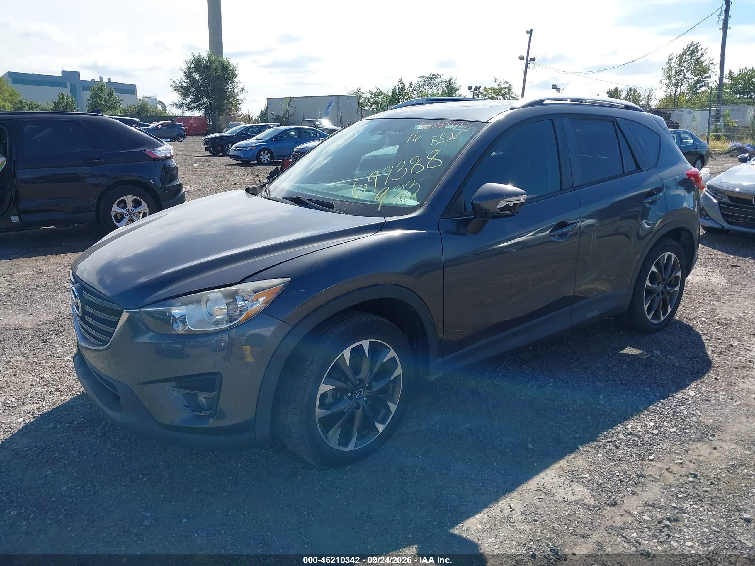 2016 Mazda Cx-5 VIN JM3KE2DY6G0697388 IAAI salvage auction — Theft, Rebuildable (Florida), sold $5,300 on 2026-10-07 (photo 2)