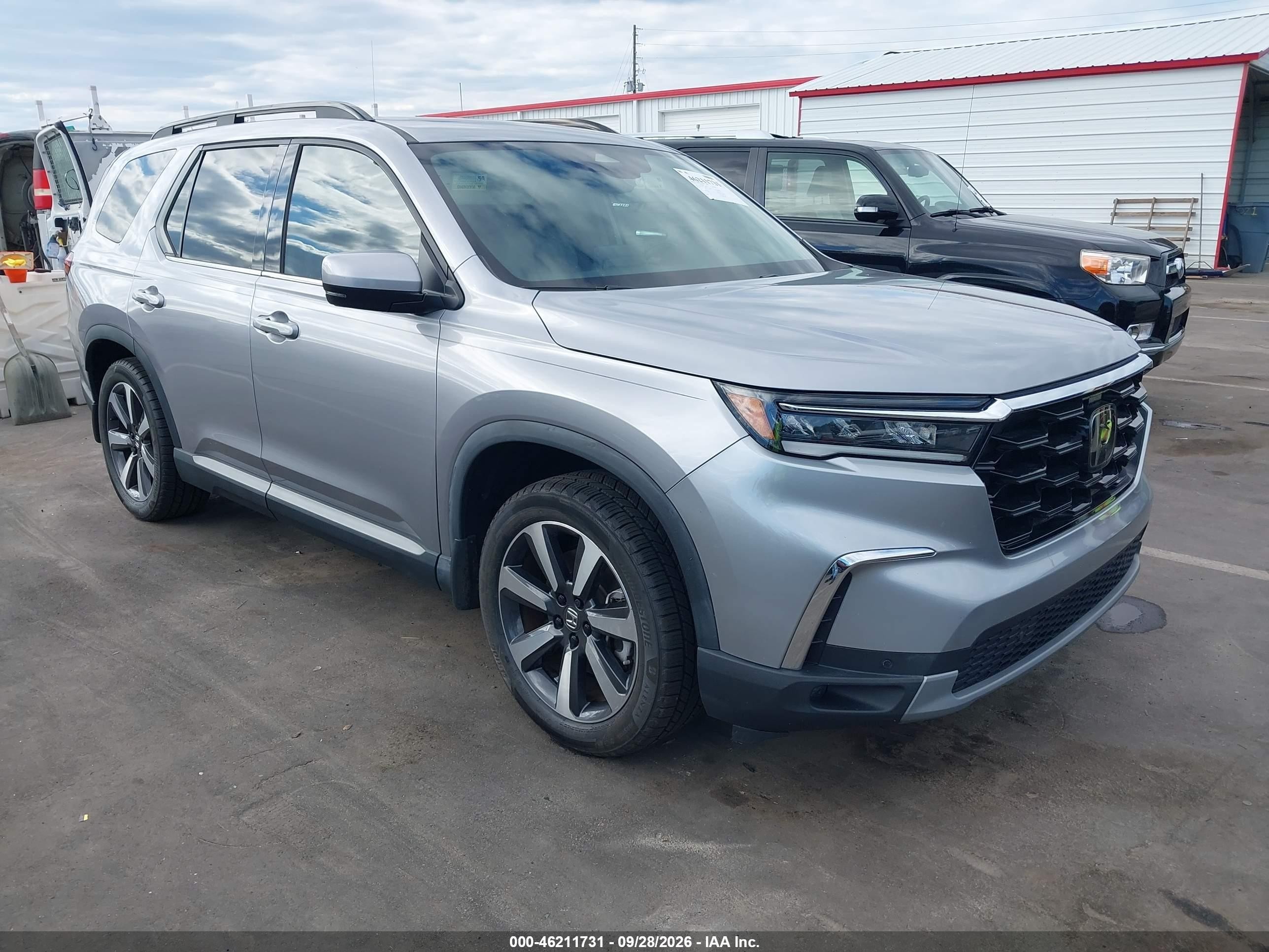 2023 Honda Pilot VIN 5FNYG1H74PB021371 — IAAI salvage auction photo