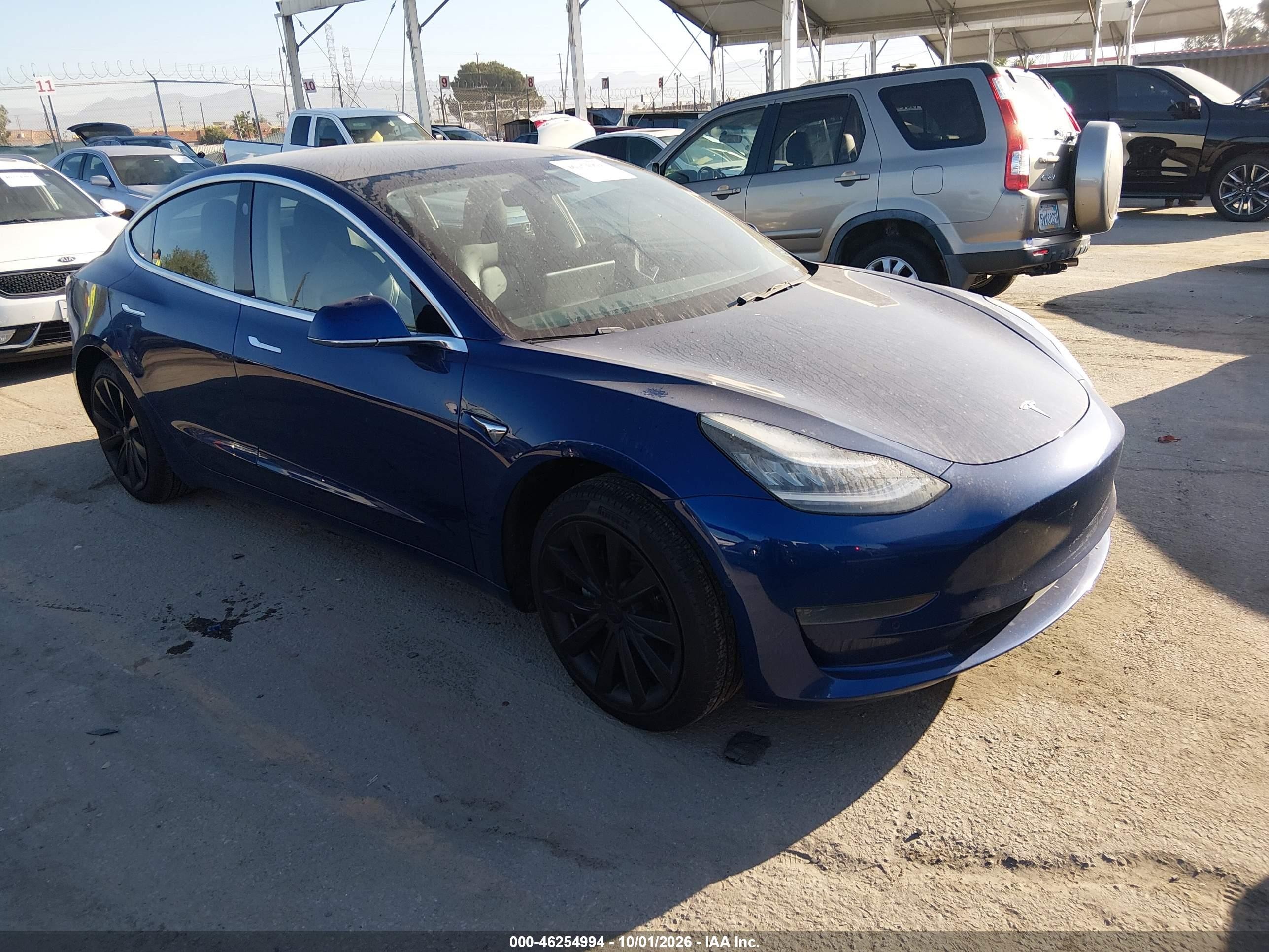 2019 Tesla Model 3 VIN 5YJ3E1EAXKF476167 — IAAI salvage auction photo