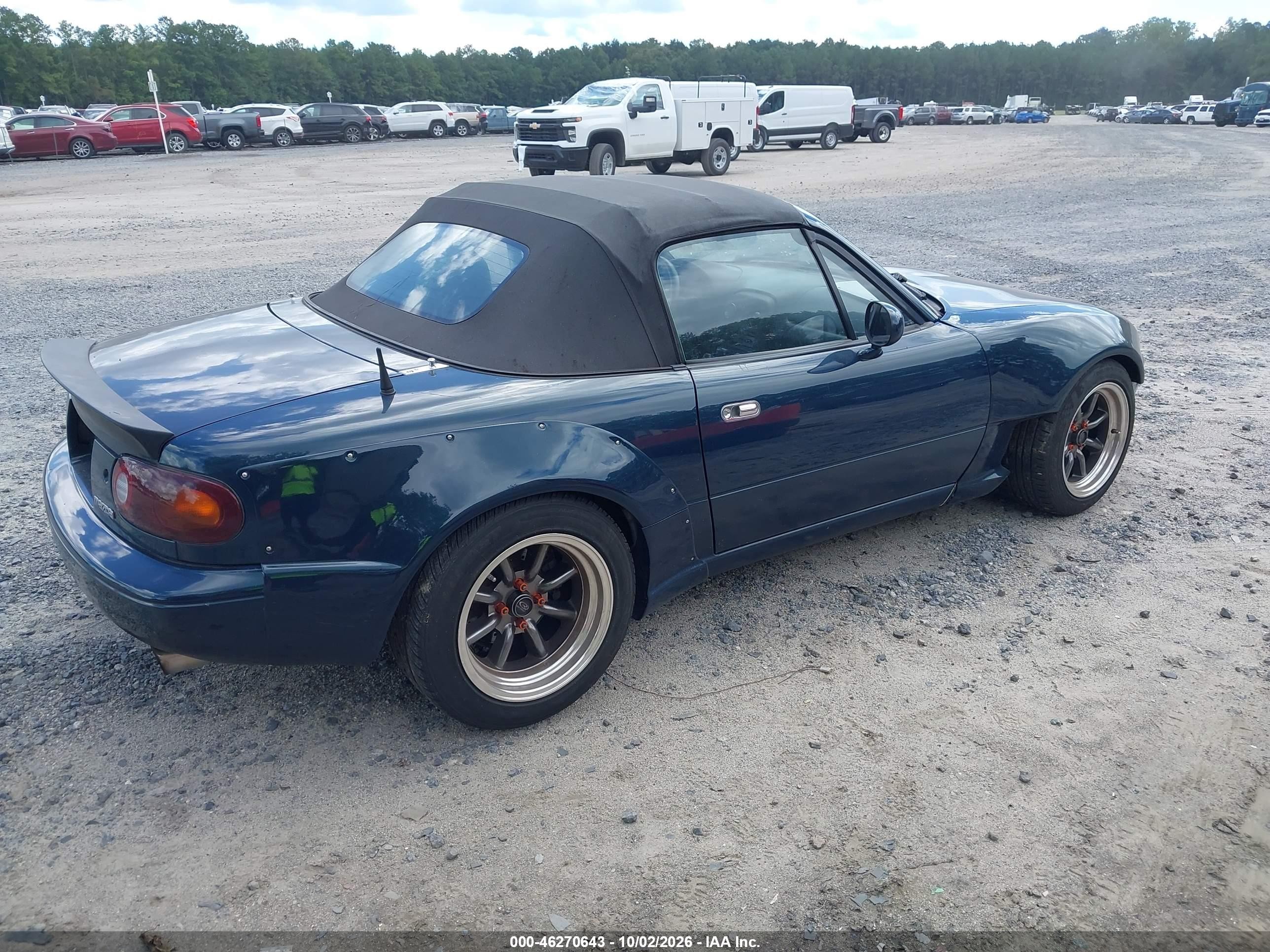 1997 Mazda Mx-5 miata VIN JM1NA3535V0730839 IAAI salvage auction — Normal Wear, Clear (Texas), sold $5,200 on 2026-10-07 (photo 4)