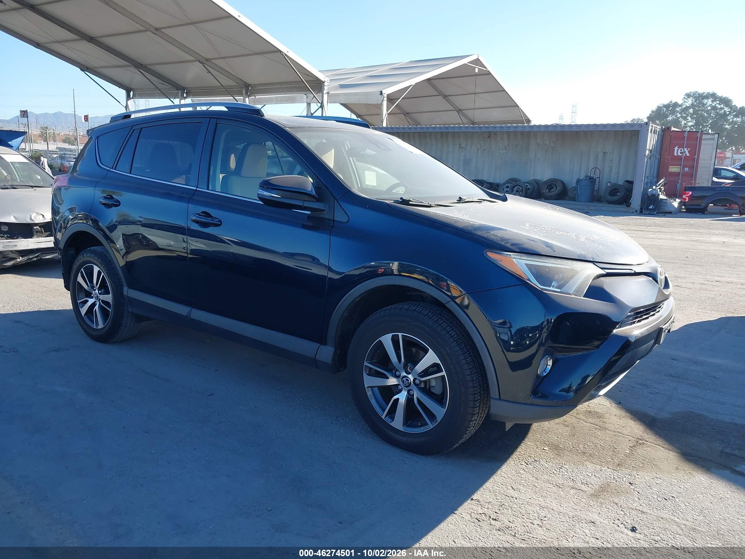 2017 Toyota RAV4 VIN JTMWFREV6HJ136575 — IAAI salvage auction photo