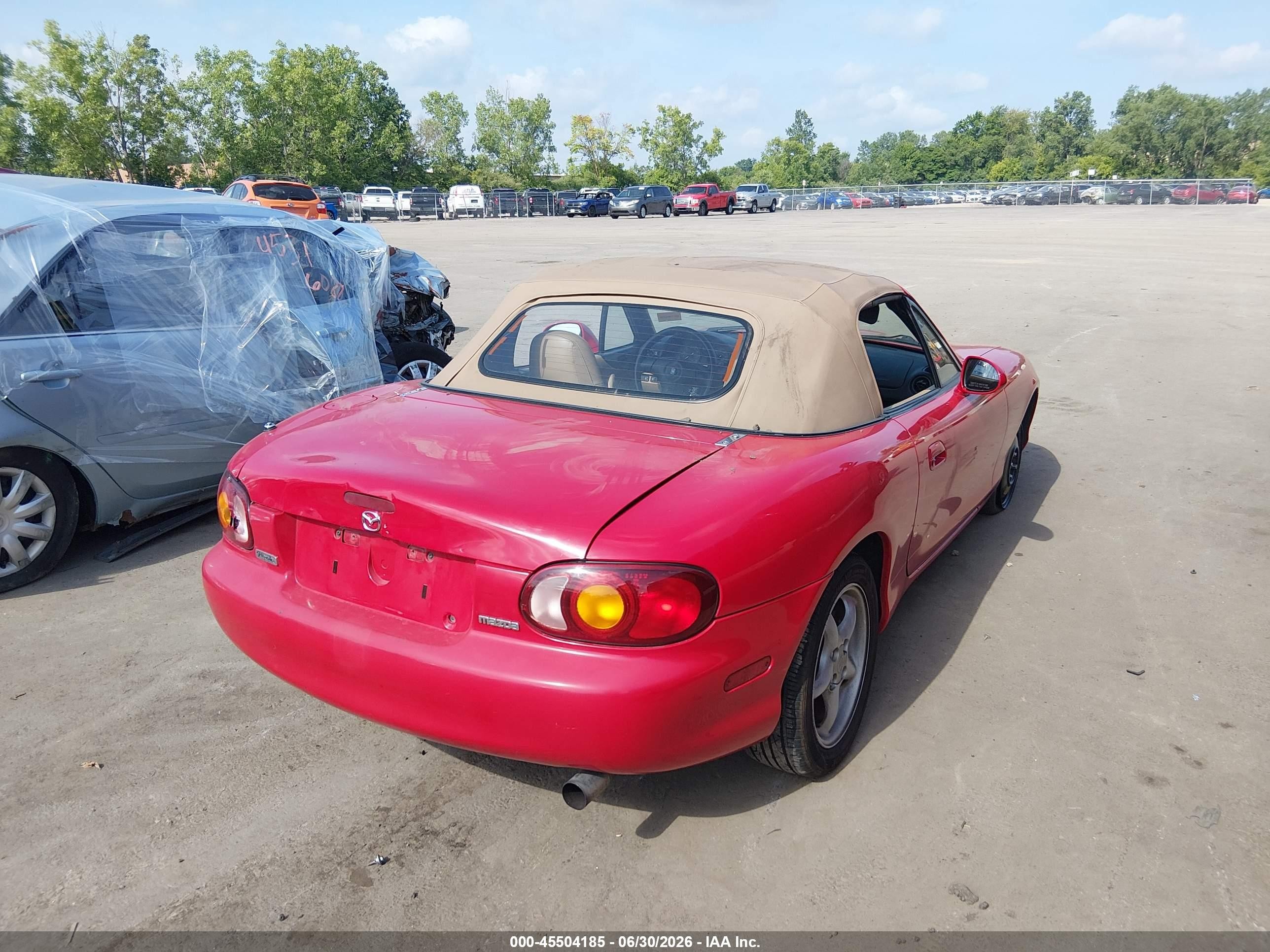 1999 Mazda MX-5 Miata VIN JM1NB3536X0113031 IAAI salvage auction — Rear End, Salvage (Ohio), sold $1,450 on 2026-07-11 (photo 4)
