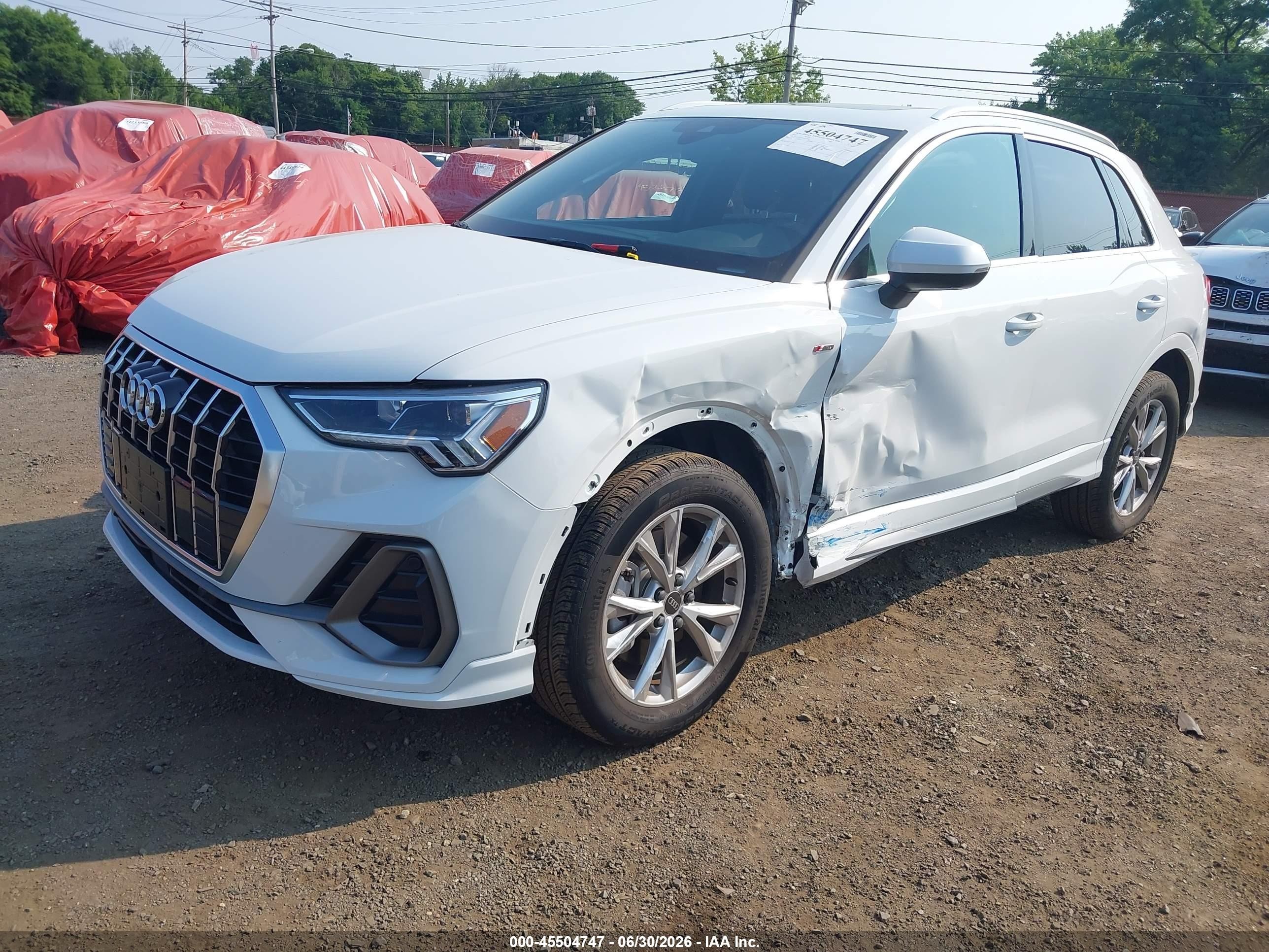 2022 Audi Q3 VIN WA1EECF34N1149887 IAAI salvage auction — Side, Salvage (Idaho), sold $11,600 on 2026-09-05 (photo 2)