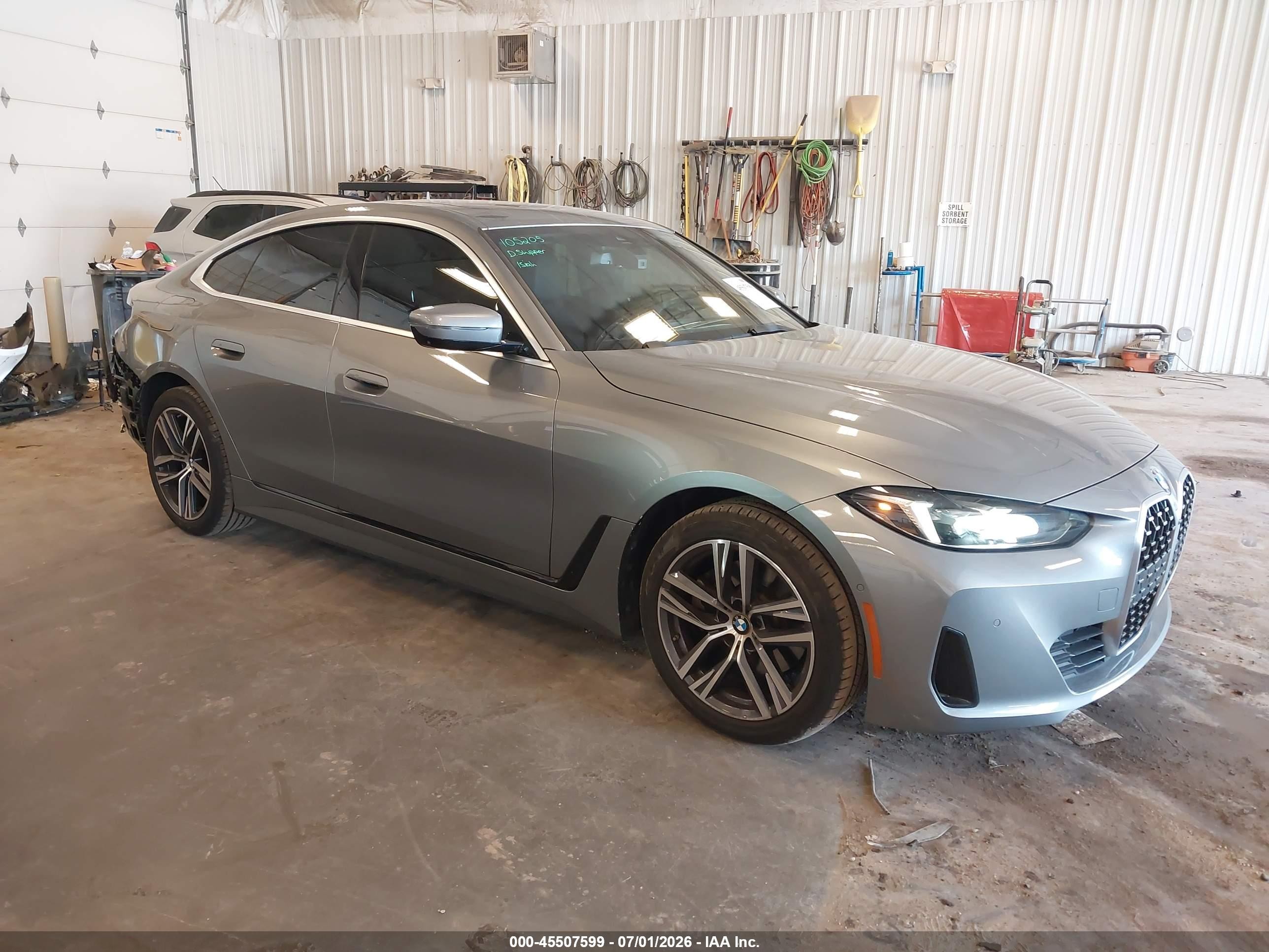 2026 BMW 4er VIN WBA33FB02TFV47855 IAAI salvage auction — Rear End, Clear (Michigan), sold $25,450 on 2026-08-17 (photo 1)