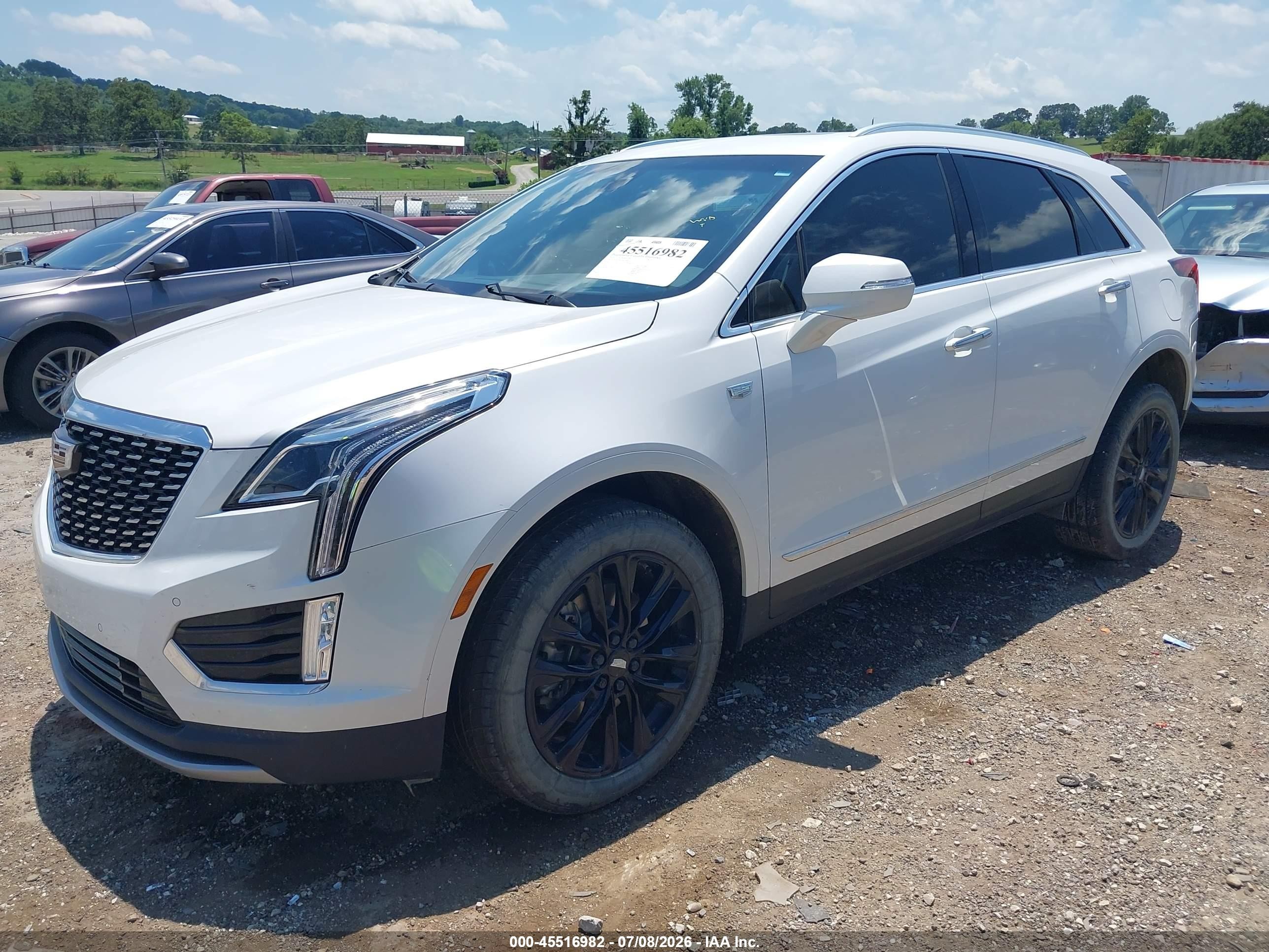 2021 Cadillac Xt5 VIN 1GYKNCRS5MZ236025 IAAI salvage auction — Side, Clear (Arkansas), sold $9,000 on 2026-09-05 (photo 2)