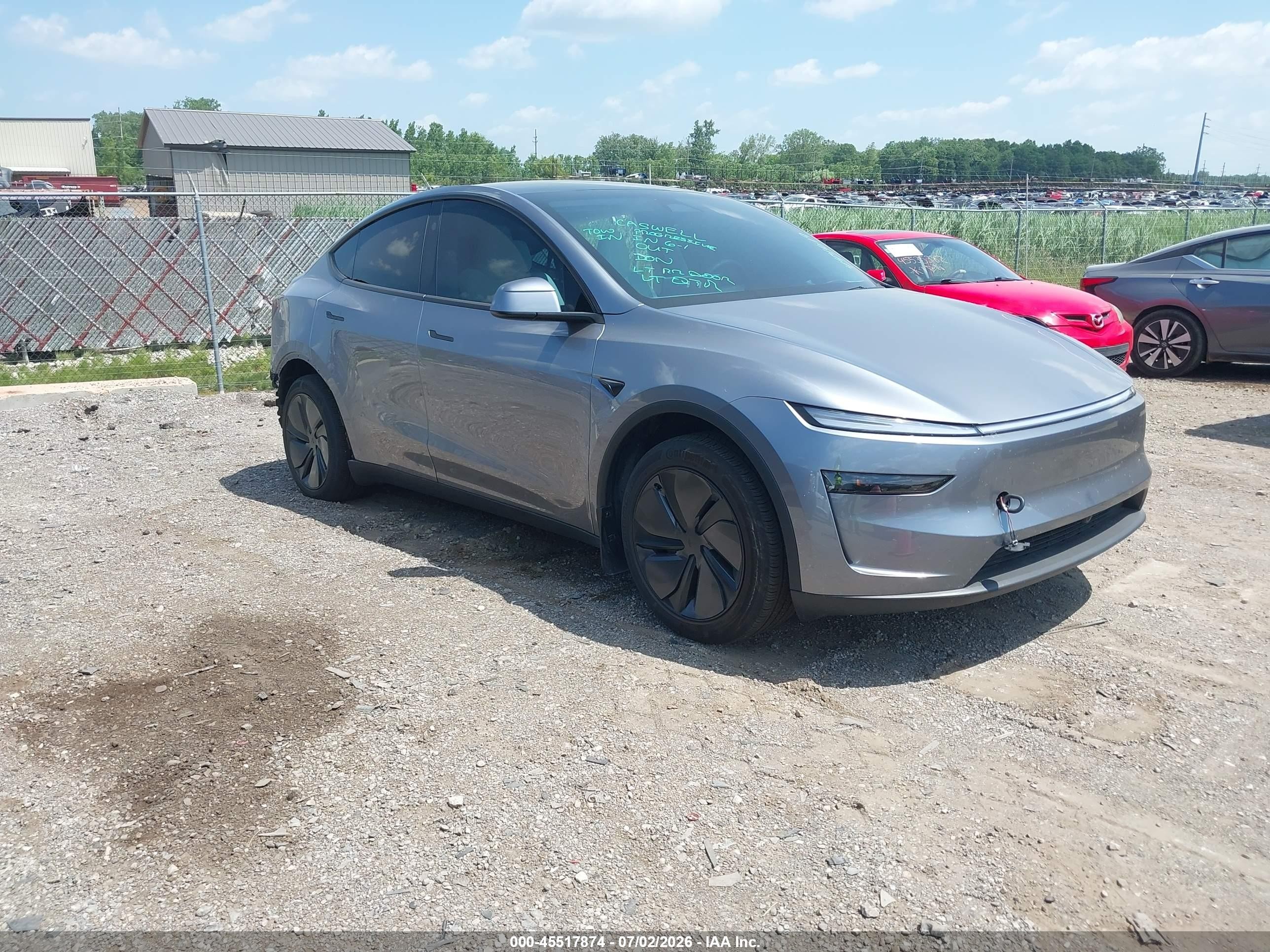 2026 Tesla Model Y VIN 7SAYGDEE1TF444619 — IAAI salvage auction photo