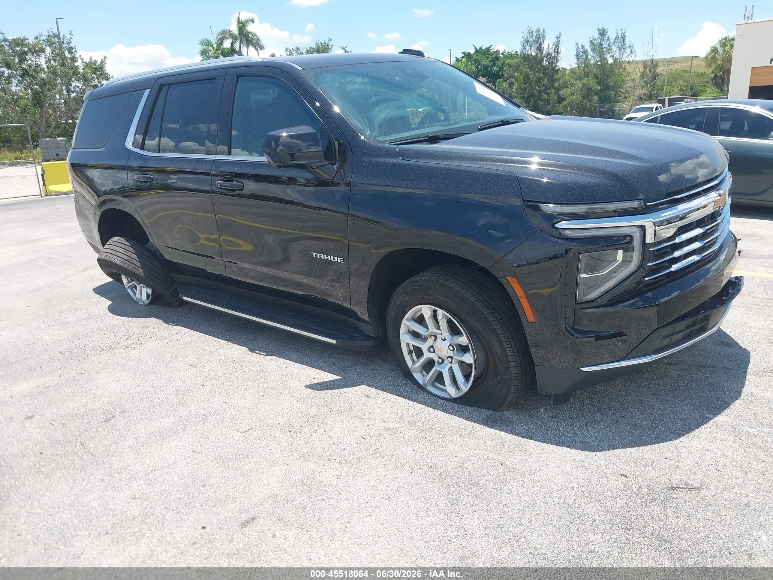 2026 Chevrolet Tahoe VIN 1GNS5NKD0TR204926 IAAI salvage auction — Side, Enterprise Vehicles Clear Only (Florida), sold $36,150 on 2026-07-02 (photo 1)