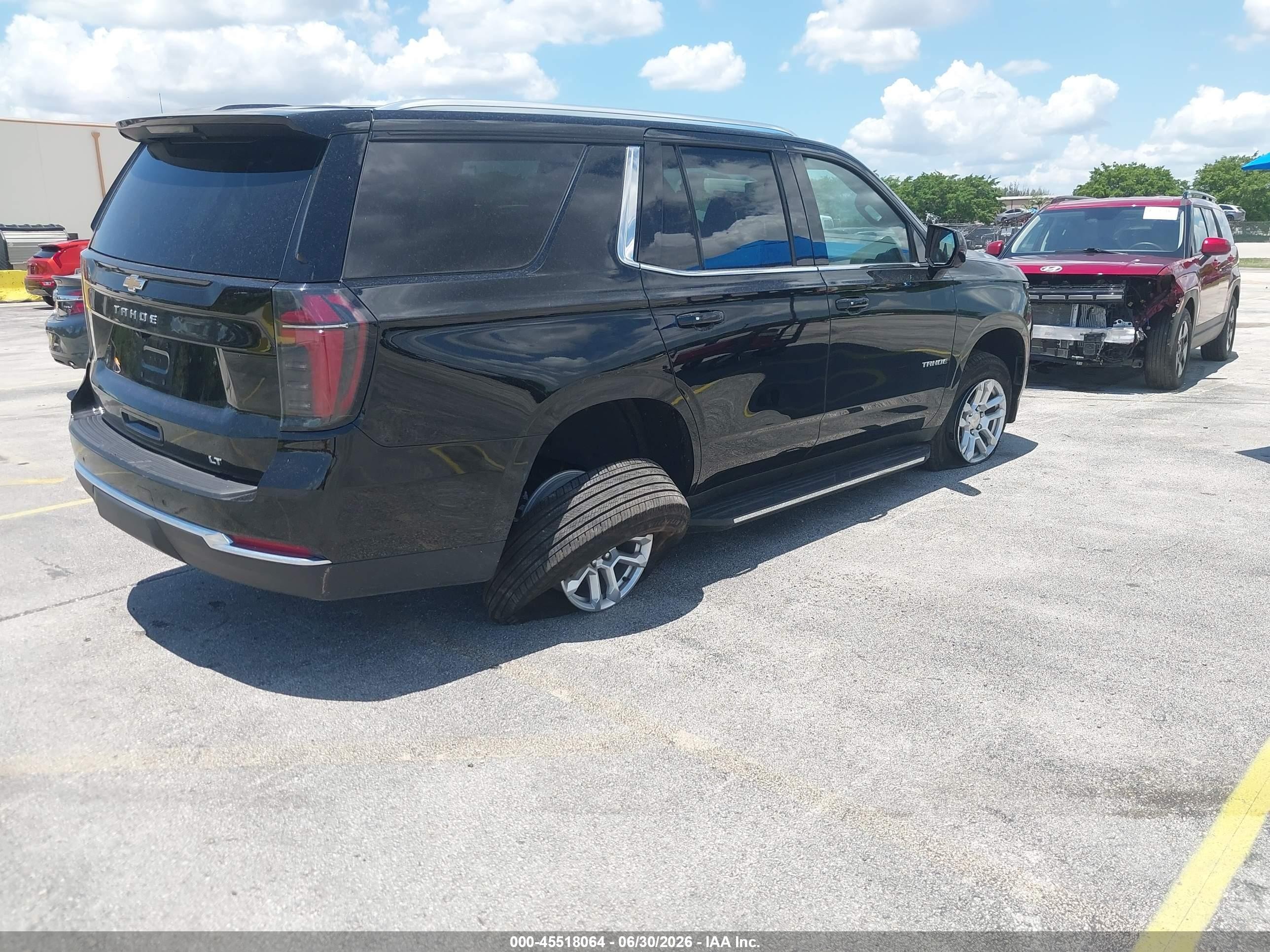 2026 Chevrolet Tahoe VIN 1GNS5NKD0TR204926 IAAI salvage auction — Side, Enterprise Vehicles Clear Only (Florida), sold $36,150 on 2026-07-02 (photo 4)