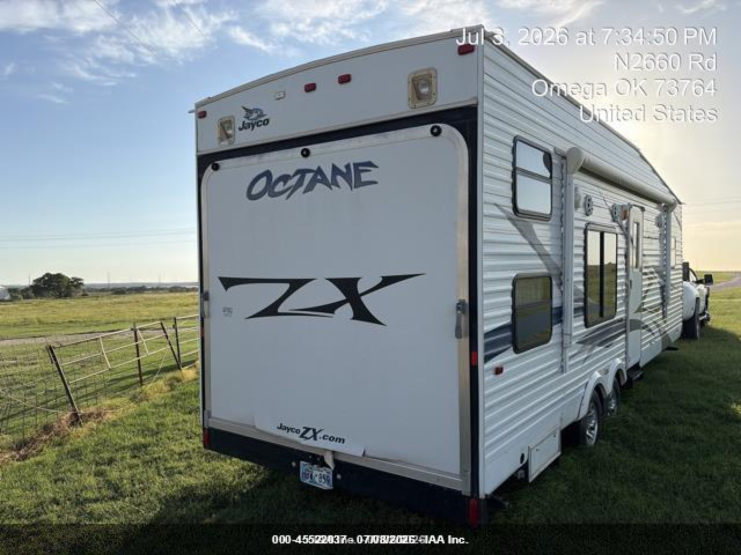 2010 Jayco Octane VIN 1UJBJSBP3A1VY0139 IAAI salvage auction — Side, Junk (Oklahoma), sold $750 on 2026-09-10 (photo 4)