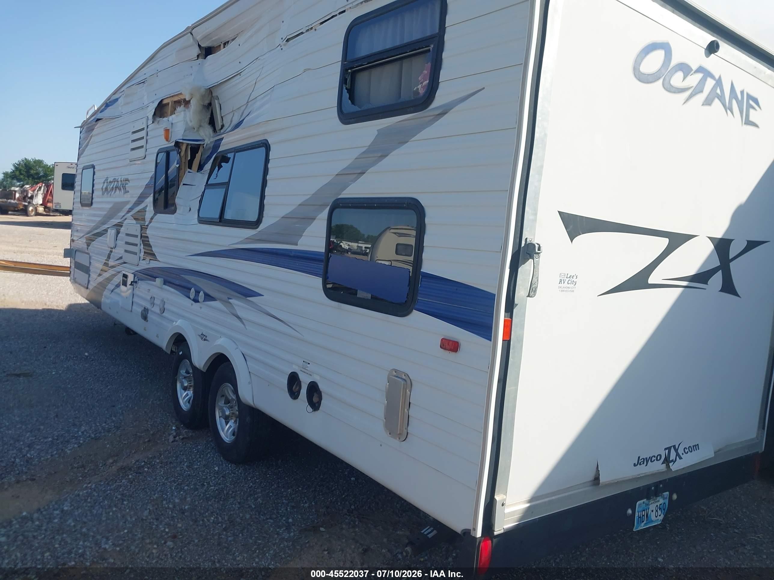 2010 Jayco Octane VIN 1UJBJSBP3A1VY0139 IAAI salvage auction — Side, Junk (Oklahoma), sold $750 on 2026-09-10 (photo 3)