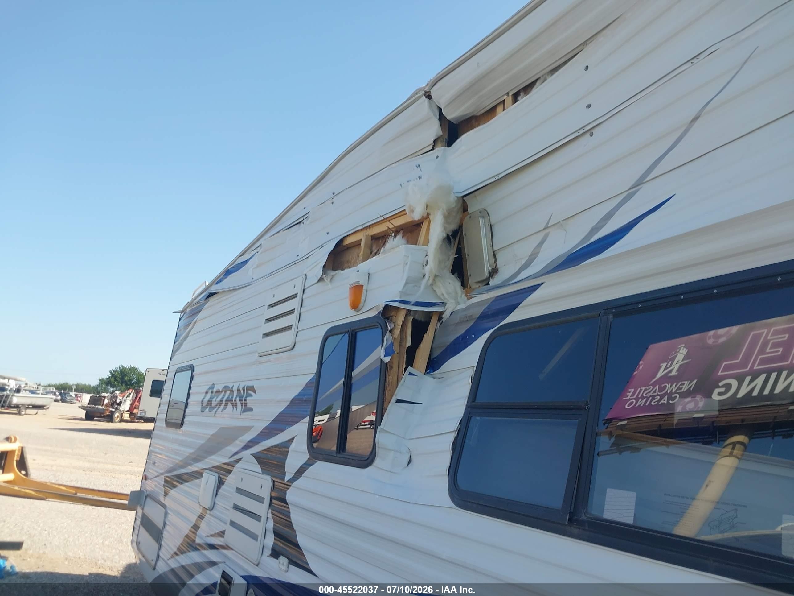 2010 Jayco Octane VIN 1UJBJSBP3A1VY0139 IAAI salvage auction — Side, Junk (Oklahoma), sold $750 on 2026-09-10 (photo 6)