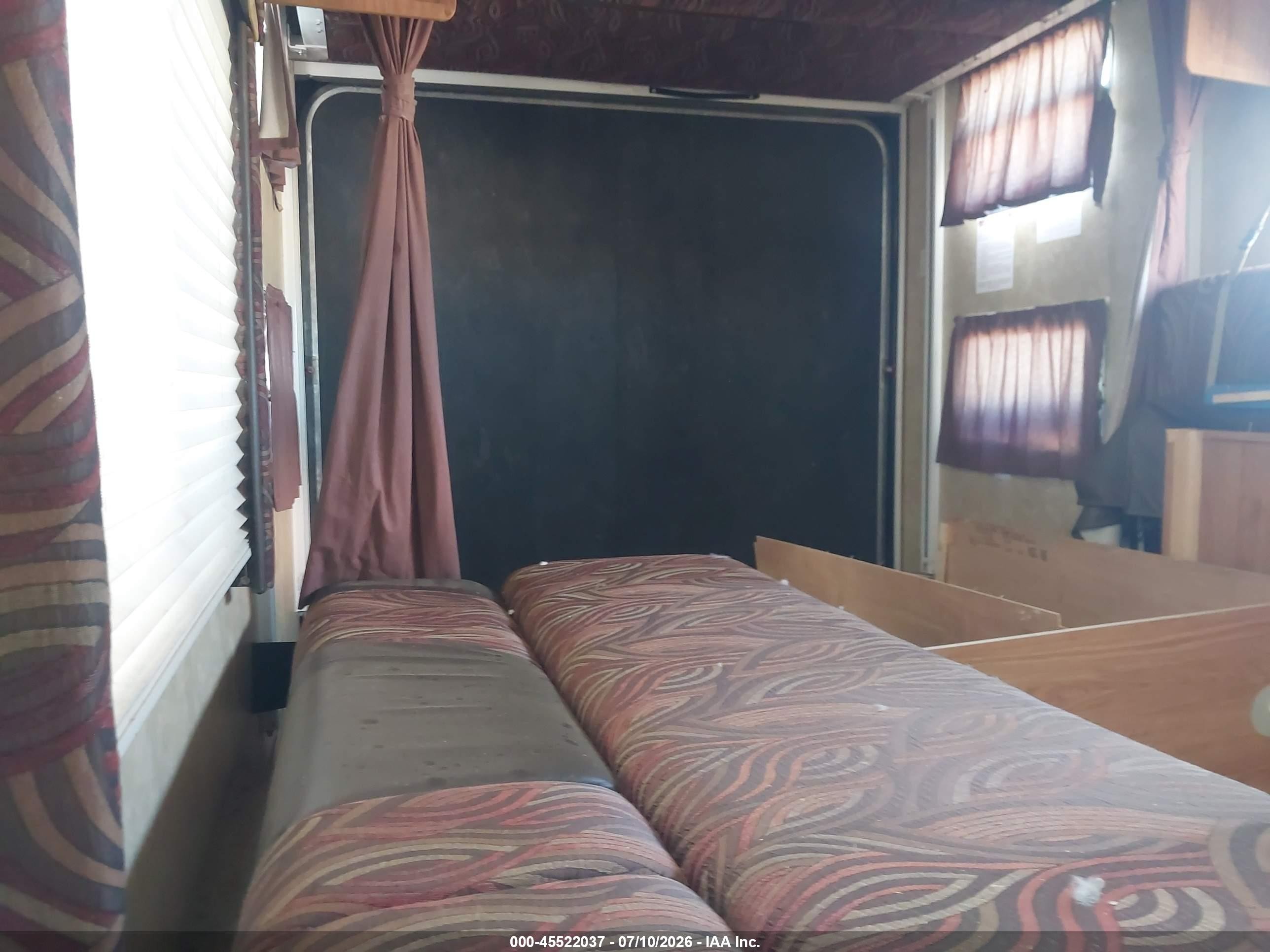 2010 Jayco Octane VIN 1UJBJSBP3A1VY0139 IAAI salvage auction — Side, Junk (Oklahoma), sold $750 on 2026-09-10 (photo 8)