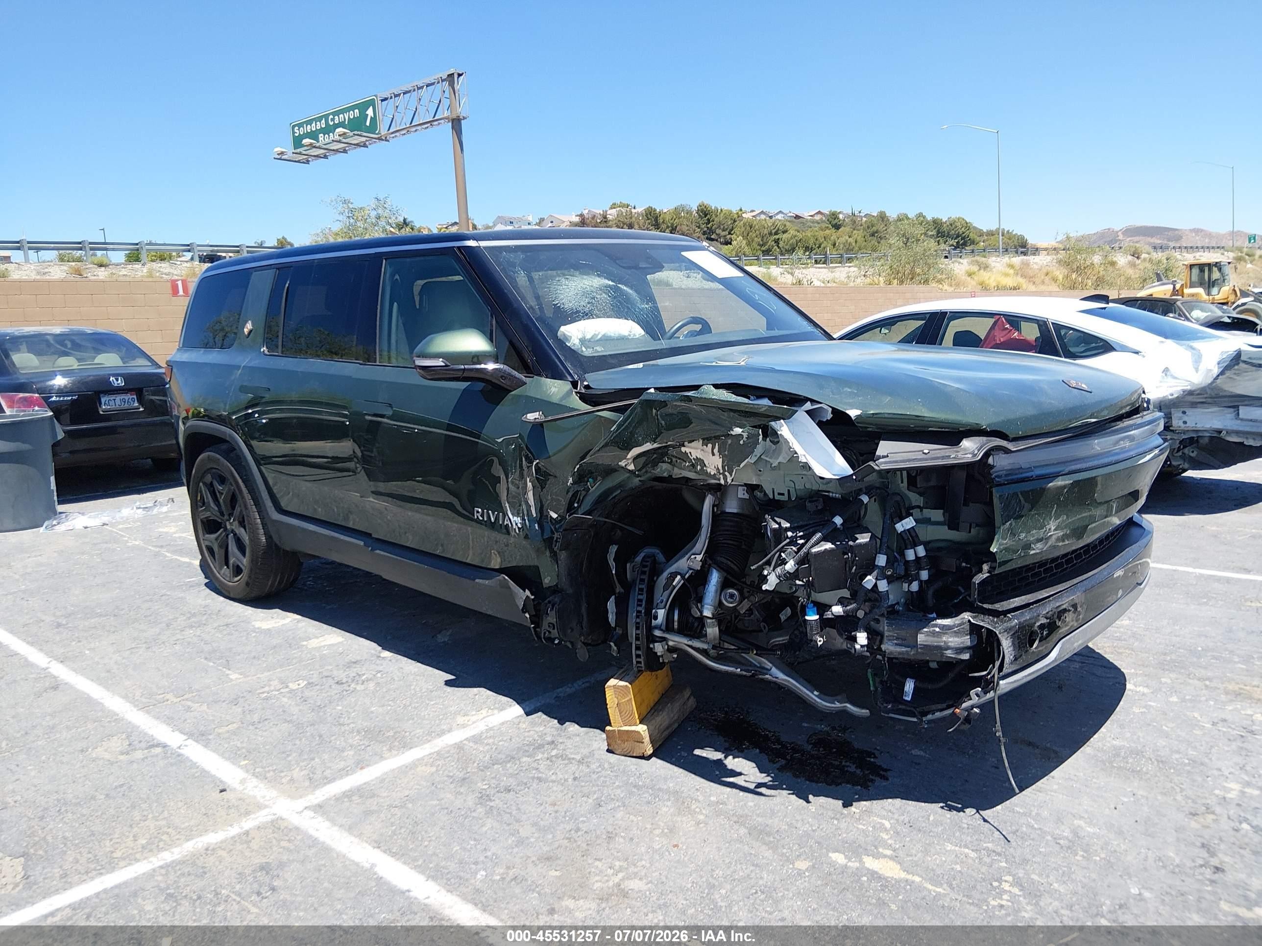 2025 Rivian R1s VIN 7PDSGBBAXSN069279 IAAI salvage auction — Unknown, Salvage (California), sold $12,500 on 2026-08-31 (photo 1)