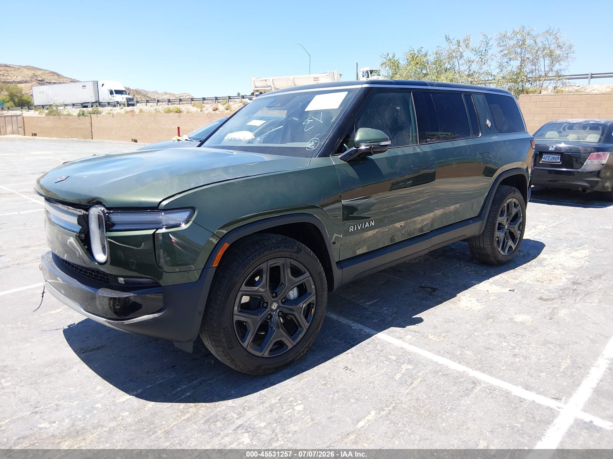 2025 Rivian R1s VIN 7PDSGBBAXSN069279 IAAI salvage auction — Unknown, Salvage (California), sold $12,500 on 2026-08-31 (photo 2)