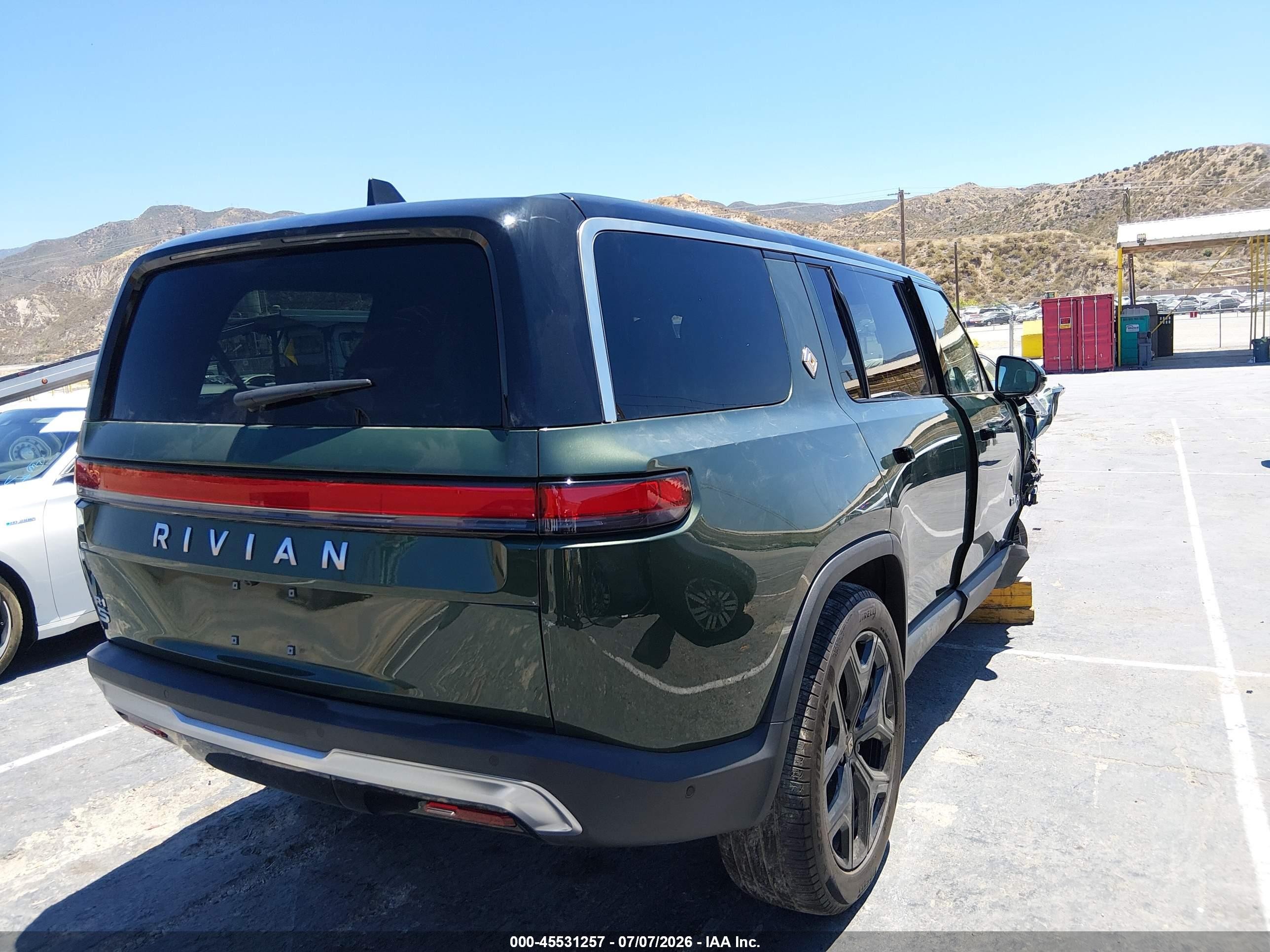 2025 Rivian R1s VIN 7PDSGBBAXSN069279 IAAI salvage auction — Unknown, Salvage (California), sold $12,500 on 2026-08-31 (photo 4)