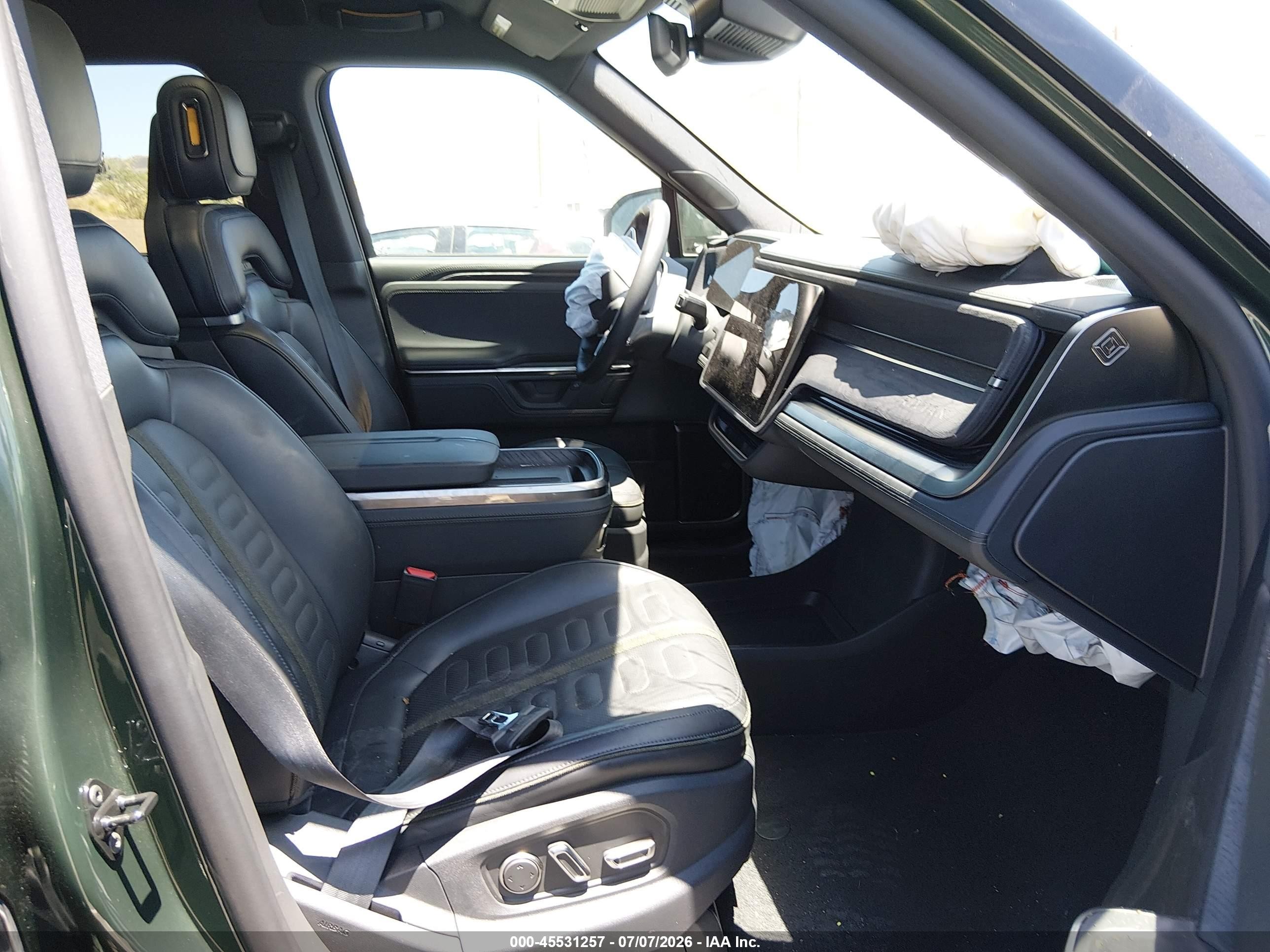 2025 Rivian R1s VIN 7PDSGBBAXSN069279 IAAI salvage auction — Unknown, Salvage (California), sold $12,500 on 2026-08-31 (photo 5)
