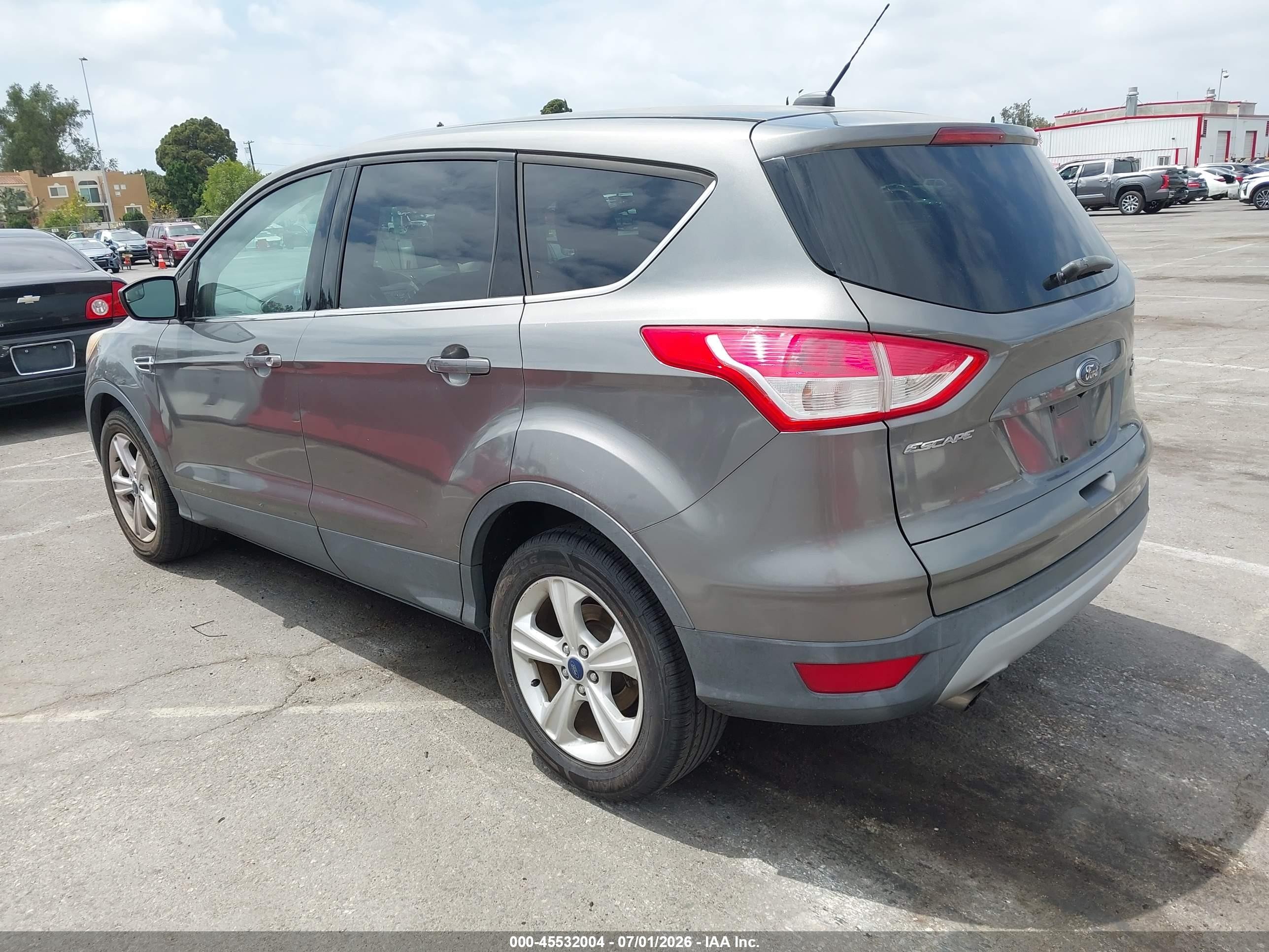 2014 Ford Escape VIN 1FMCU0GXXEUC61703 IAAI salvage auction — Normal Wear, Clear - Dealer Only (California), sold $300 on 2026-07-09 (photo 3)